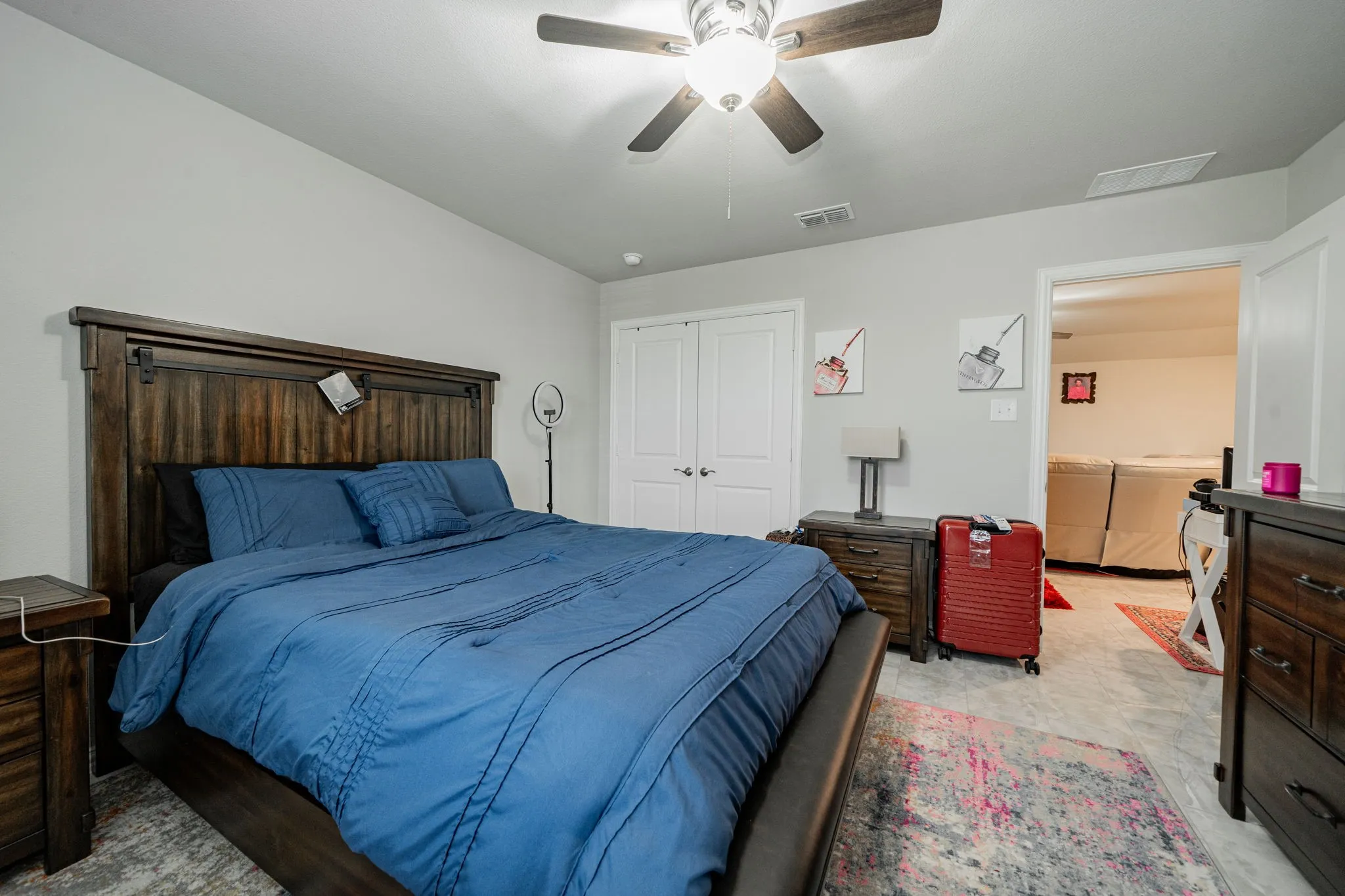 Bedroom with a closet and a ceiling fan