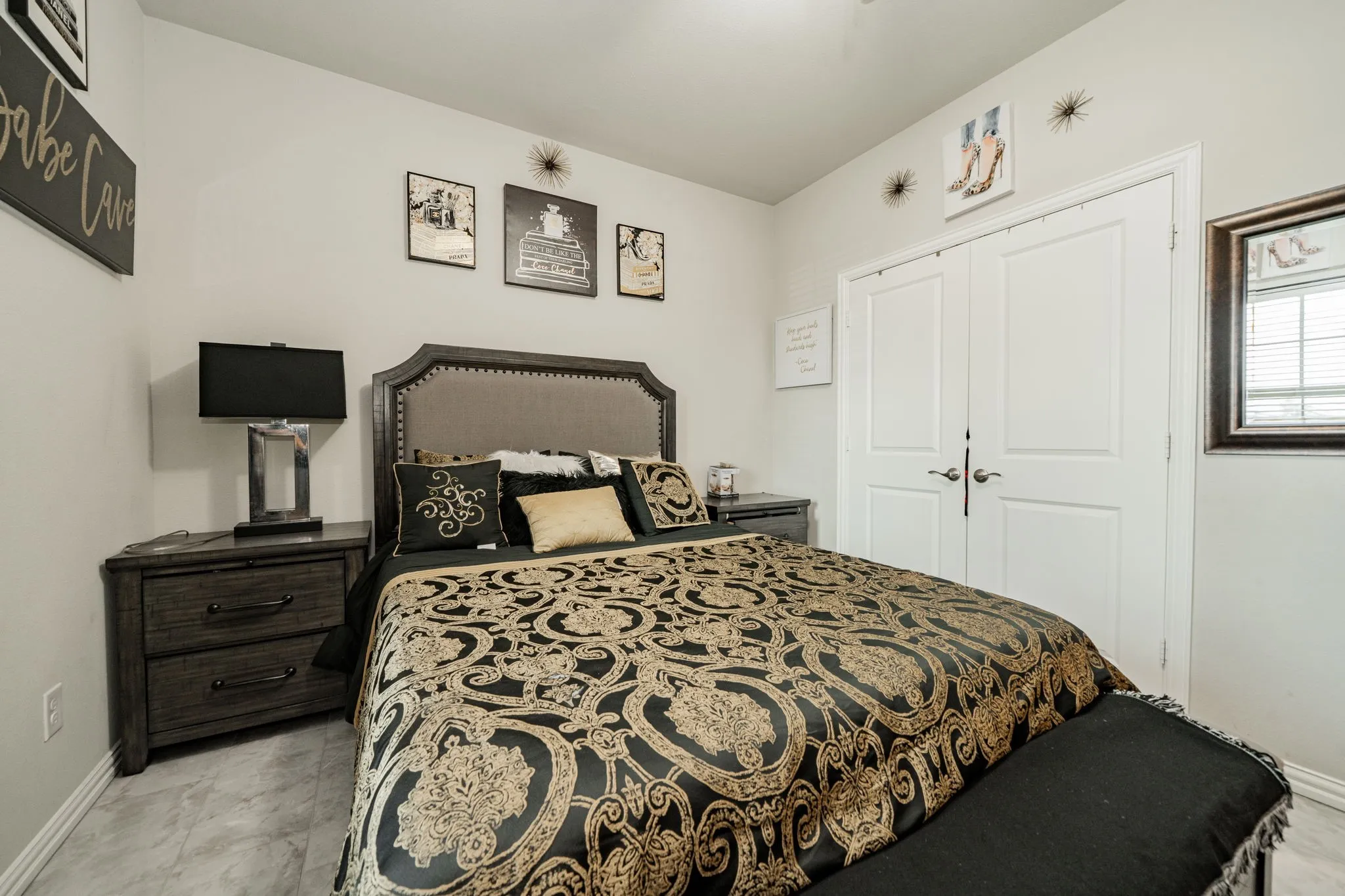 Bedroom featuring baseboards and a closet