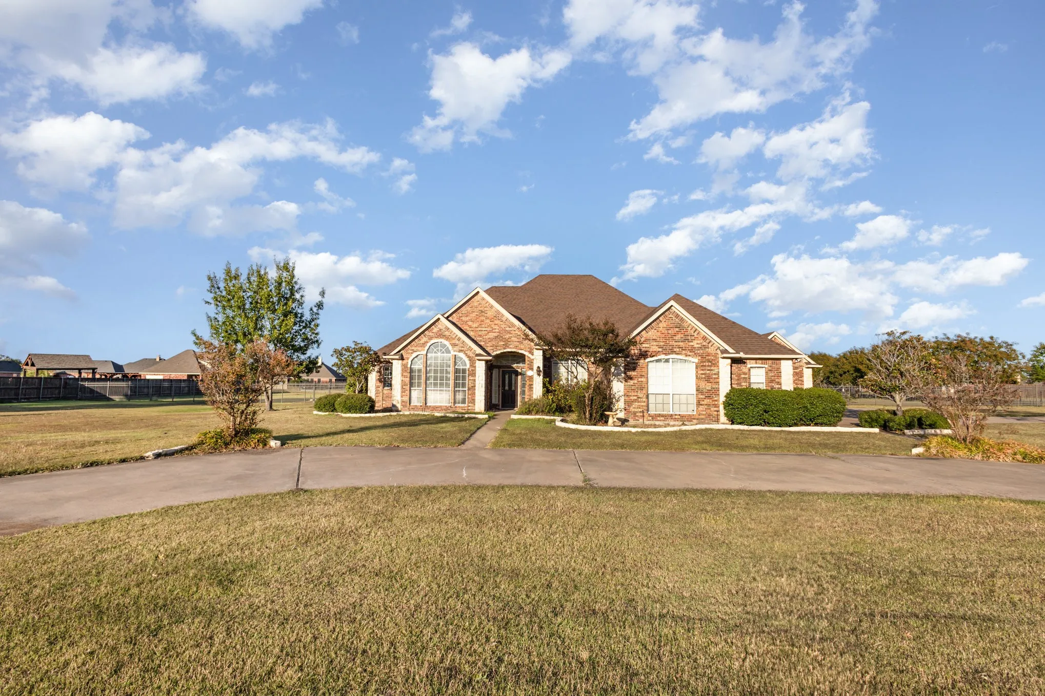 View of front facade featuring brick siding