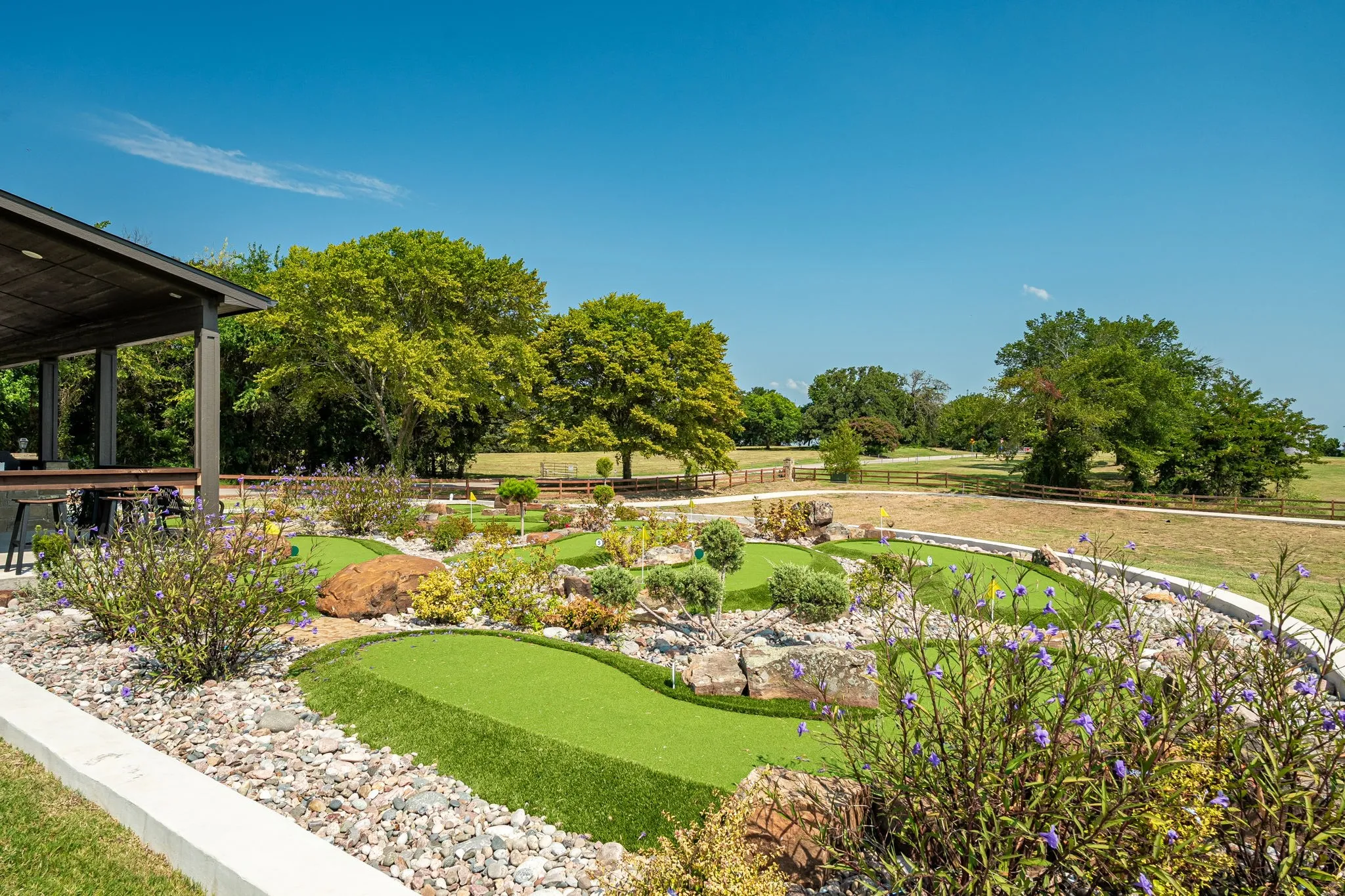 View of yard featuring a putting area for Neighborhood