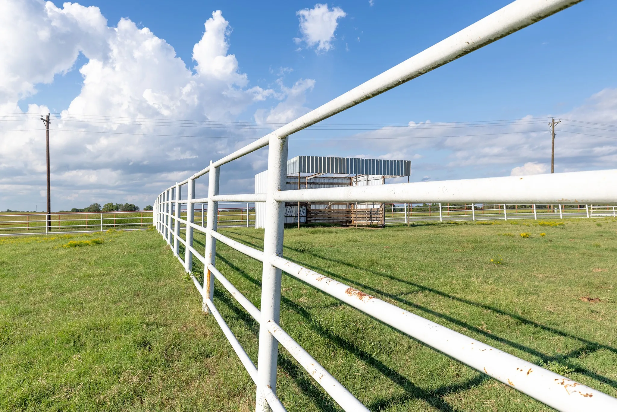 View of yard with a view of countryside, an outbuilding, and an exterior structure