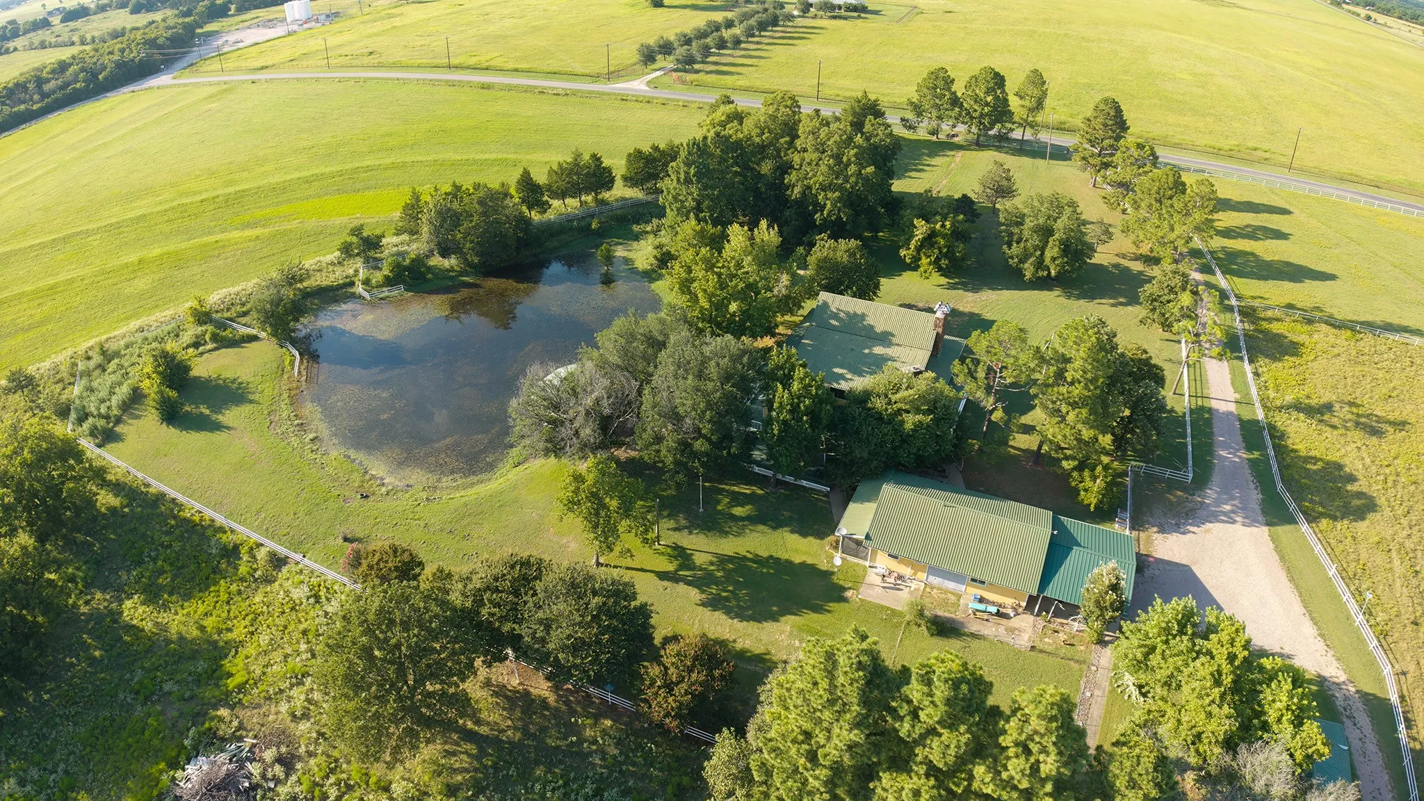 Aerial view of property and surrounding area with rural landscape and a pastoral area