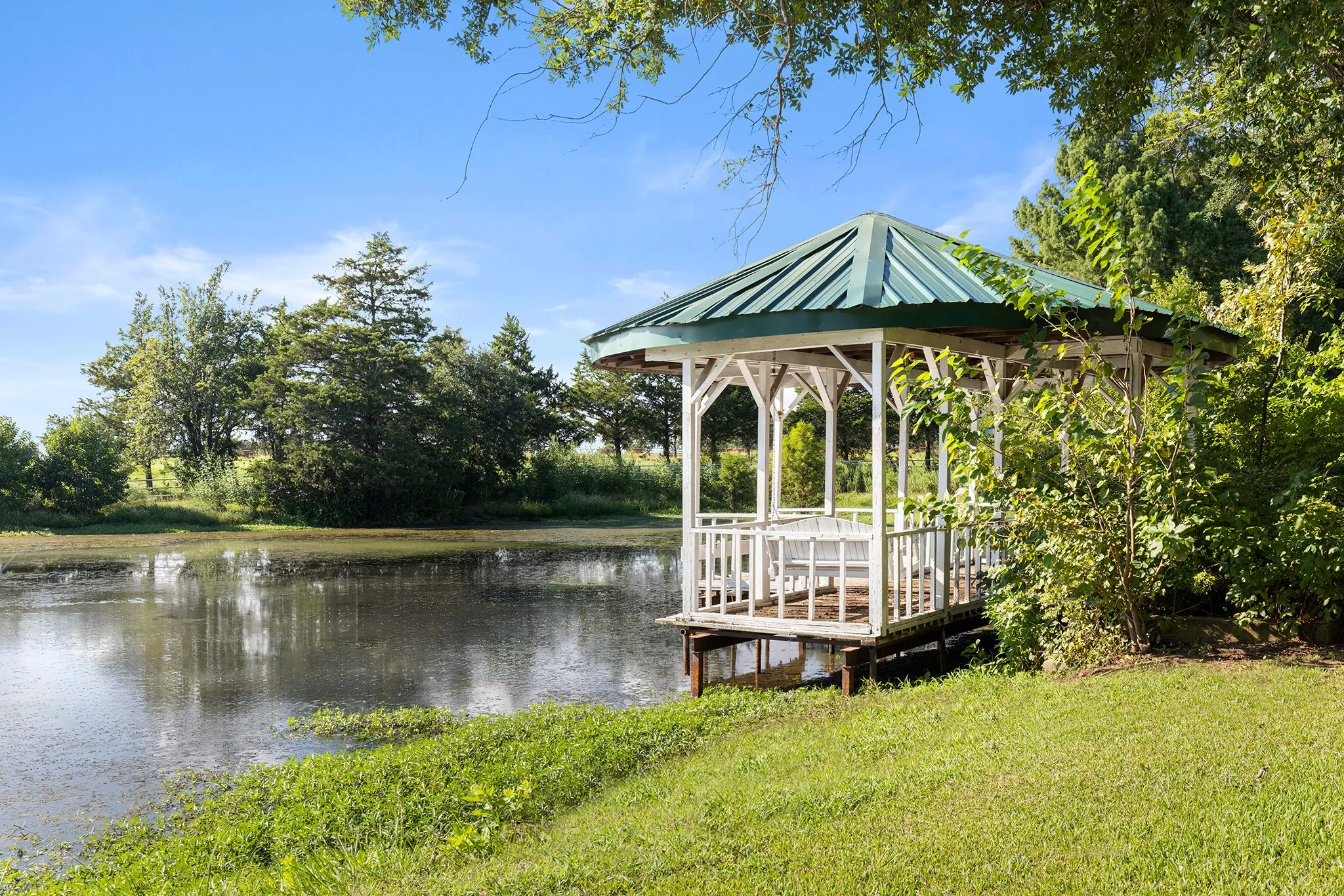 Dock featuring a water view and a yard