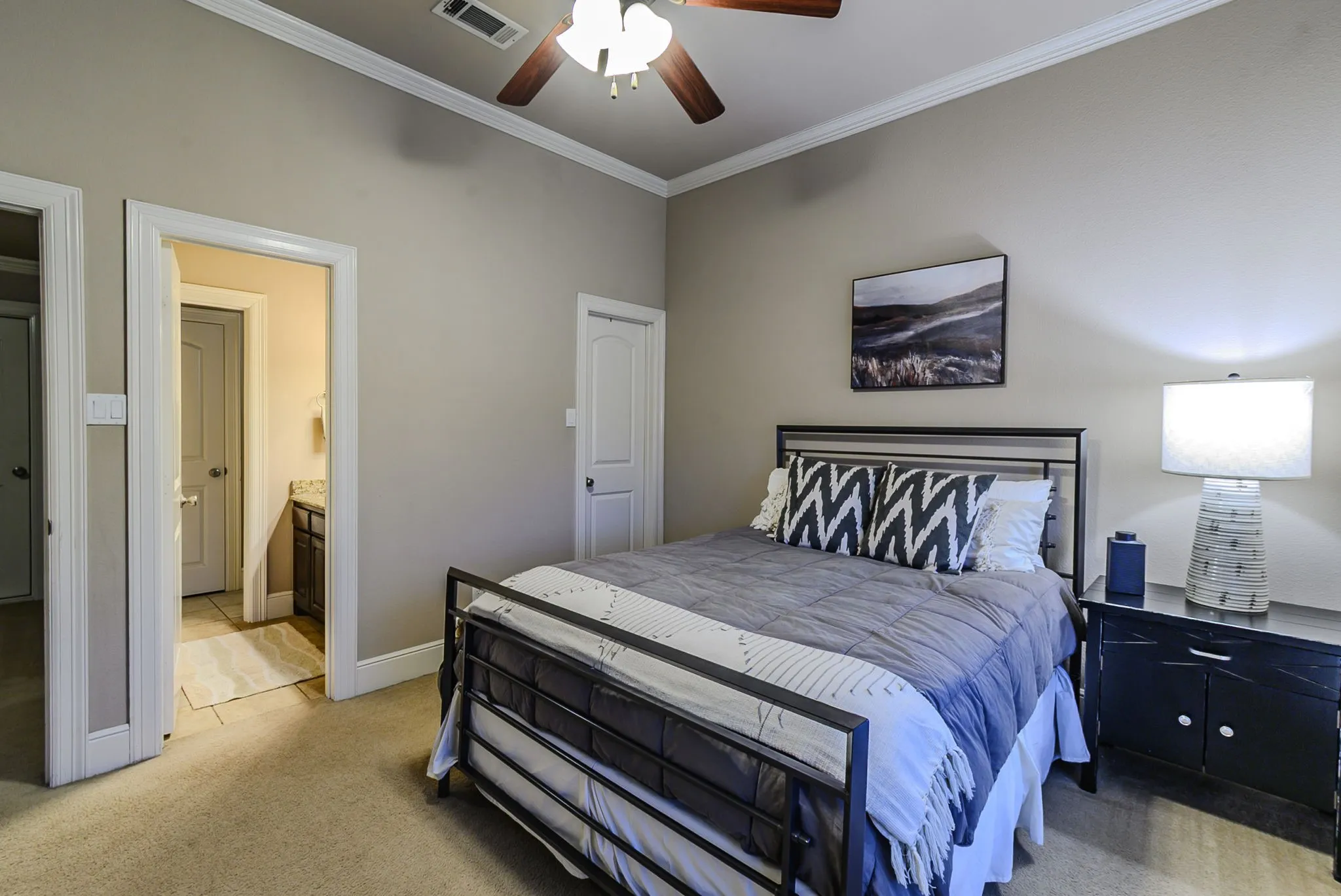 Another view of the 2nd upstairs bedroom featuring an ensuite bathroom.
