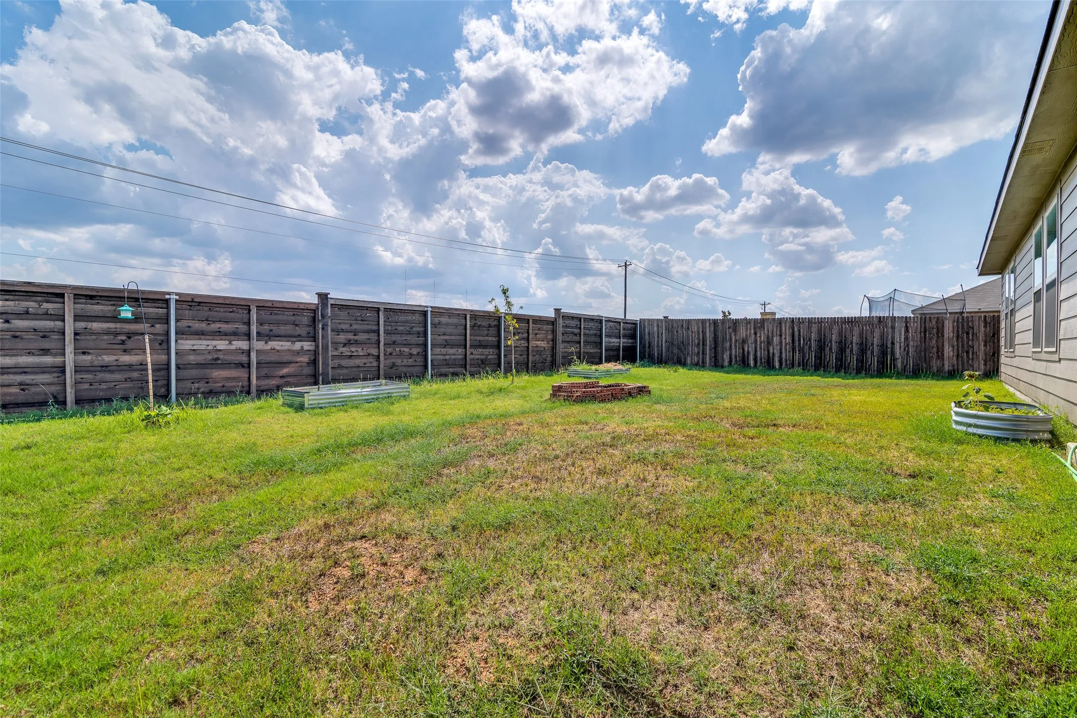 Yard ready for you - play or garden.
