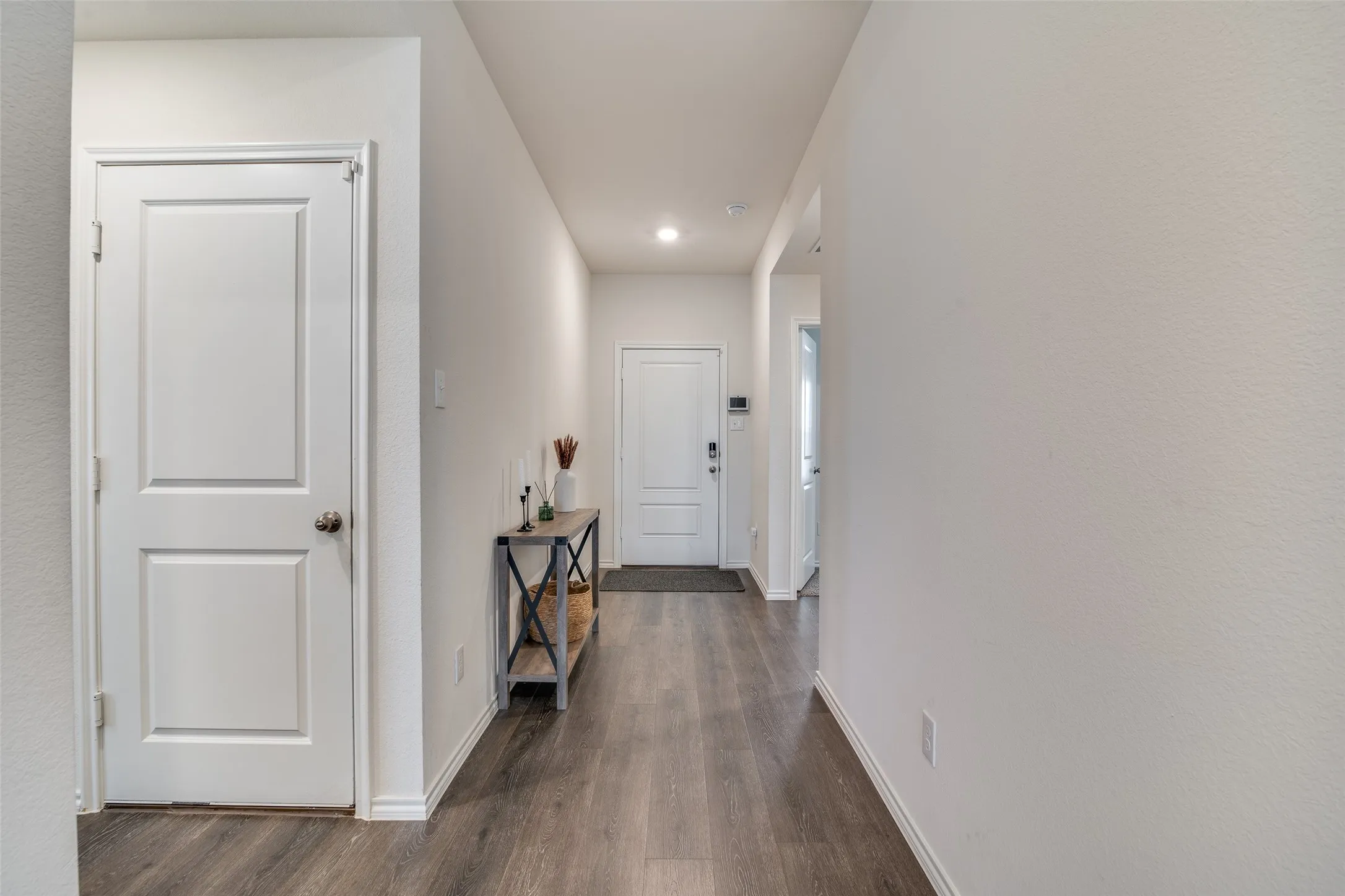 Looking back at entry from kitchen.