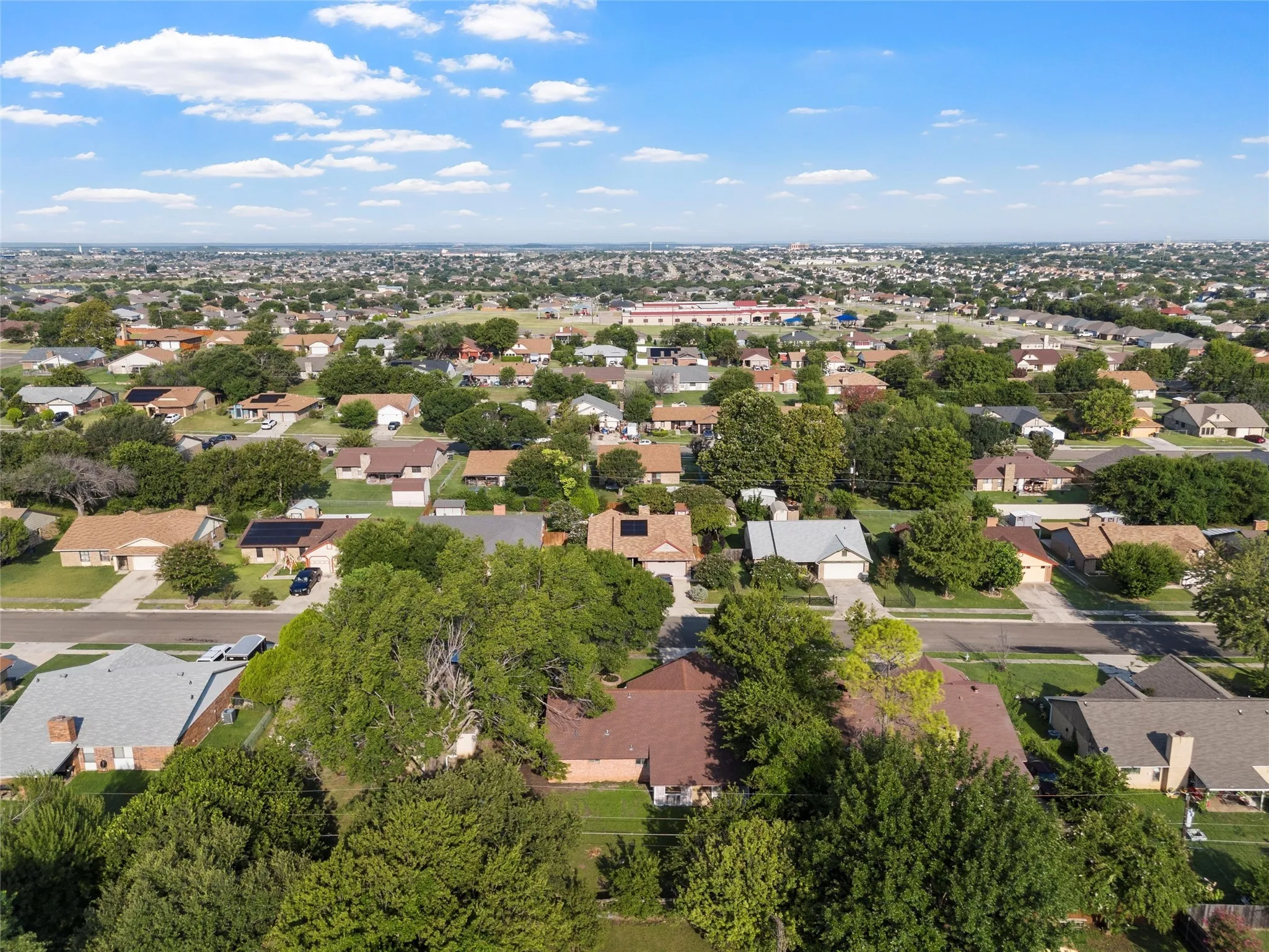 View of property location featuring nearby suburban area