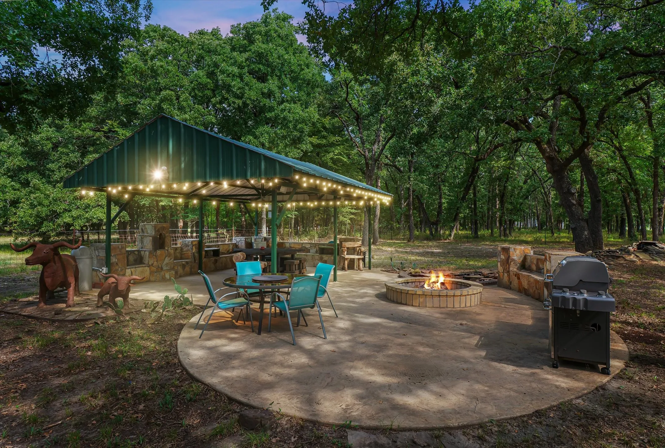 View of patio / terrace featuring grilling area and an outdoor fire pit