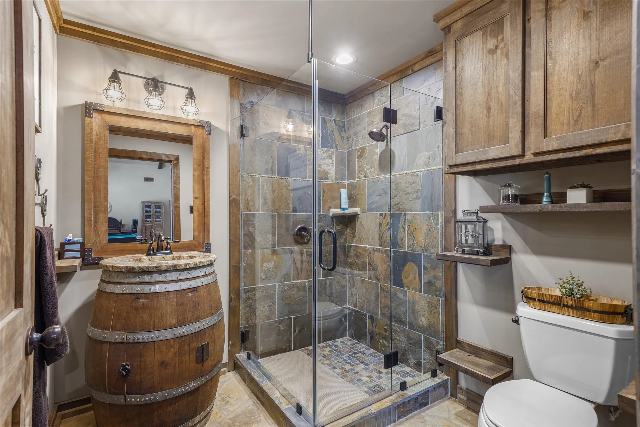 Bathroom with vanity, a stall shower, and recessed lighting