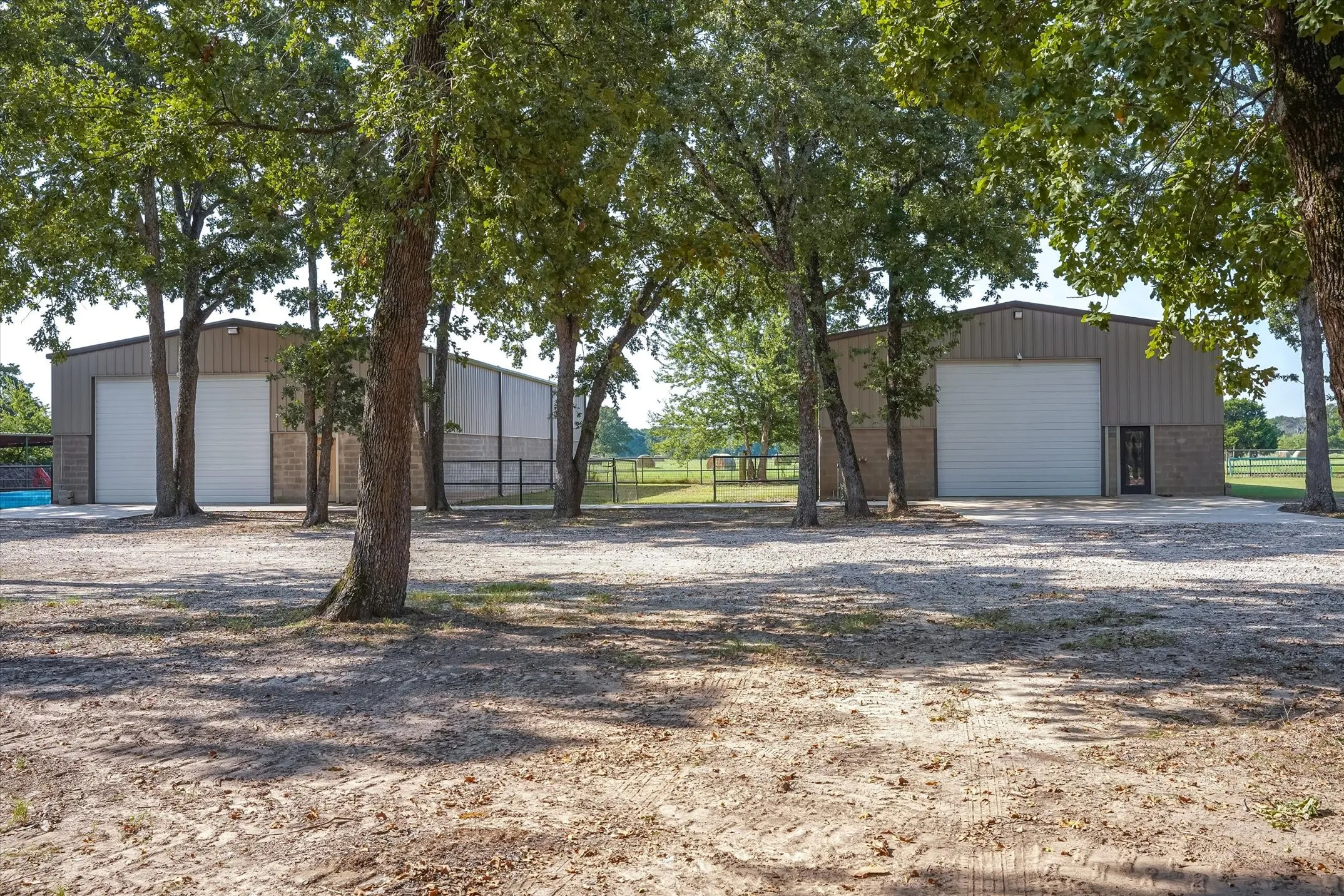 View of front of property with an outbuilding and a detached garage