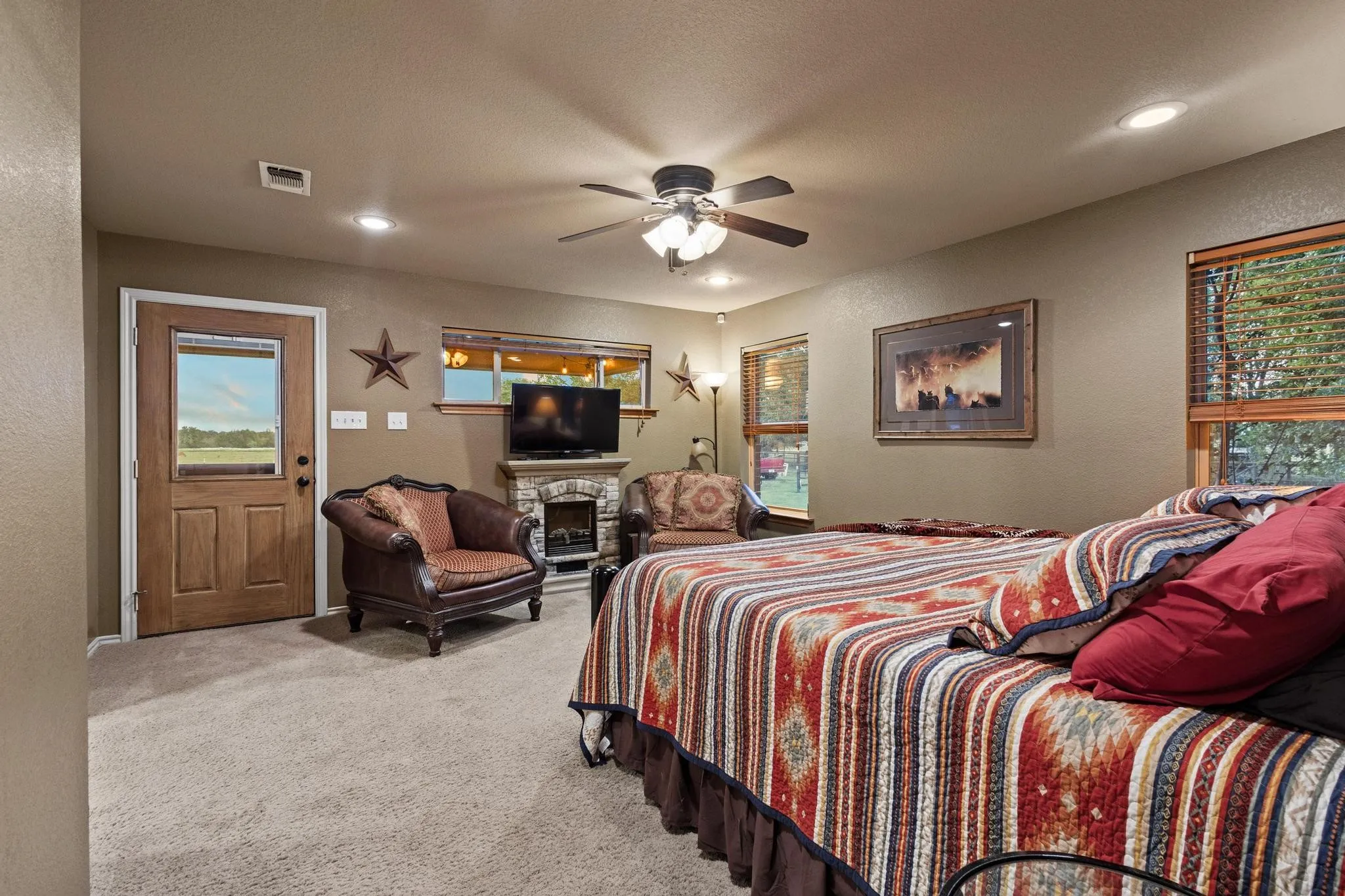 Primary bedroom with back porch access and private sitting.