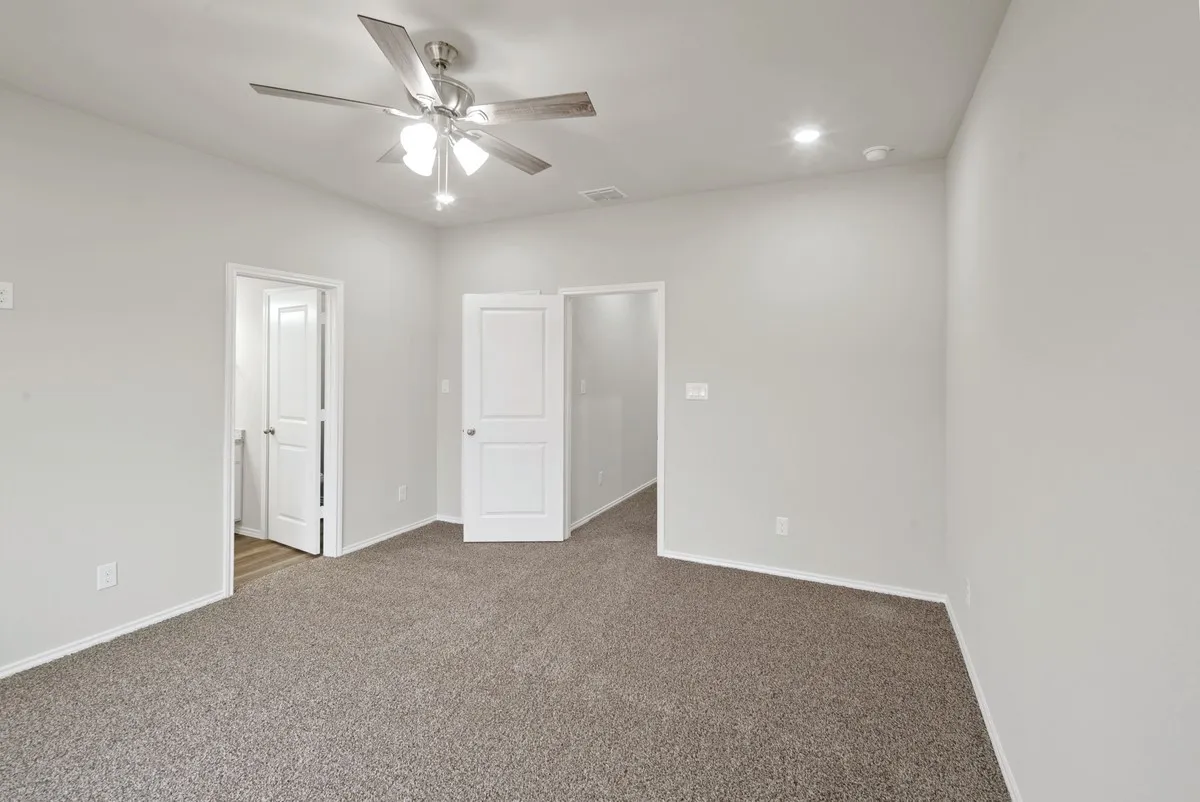 Unfurnished bedroom with carpet floors, recessed lighting, and ceiling fan