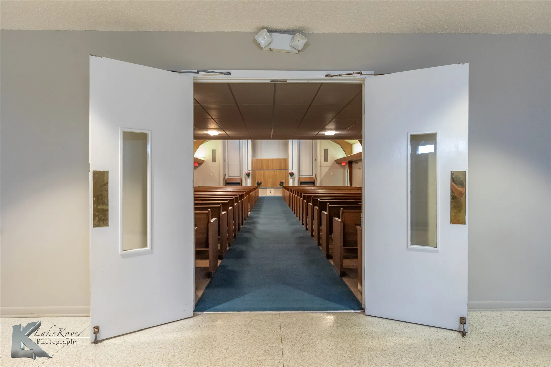 Hallway featuring elevator