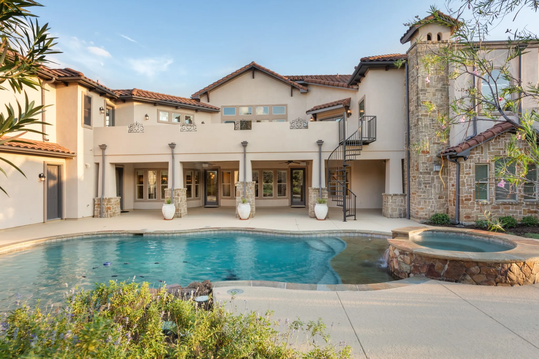 Outdoors, escape into your personal sanctuary. Mature trees provide privacy as you unwind in the spa with calf and foot jets, or entertain beneath the stars on your newly refinished cool-decked patio.