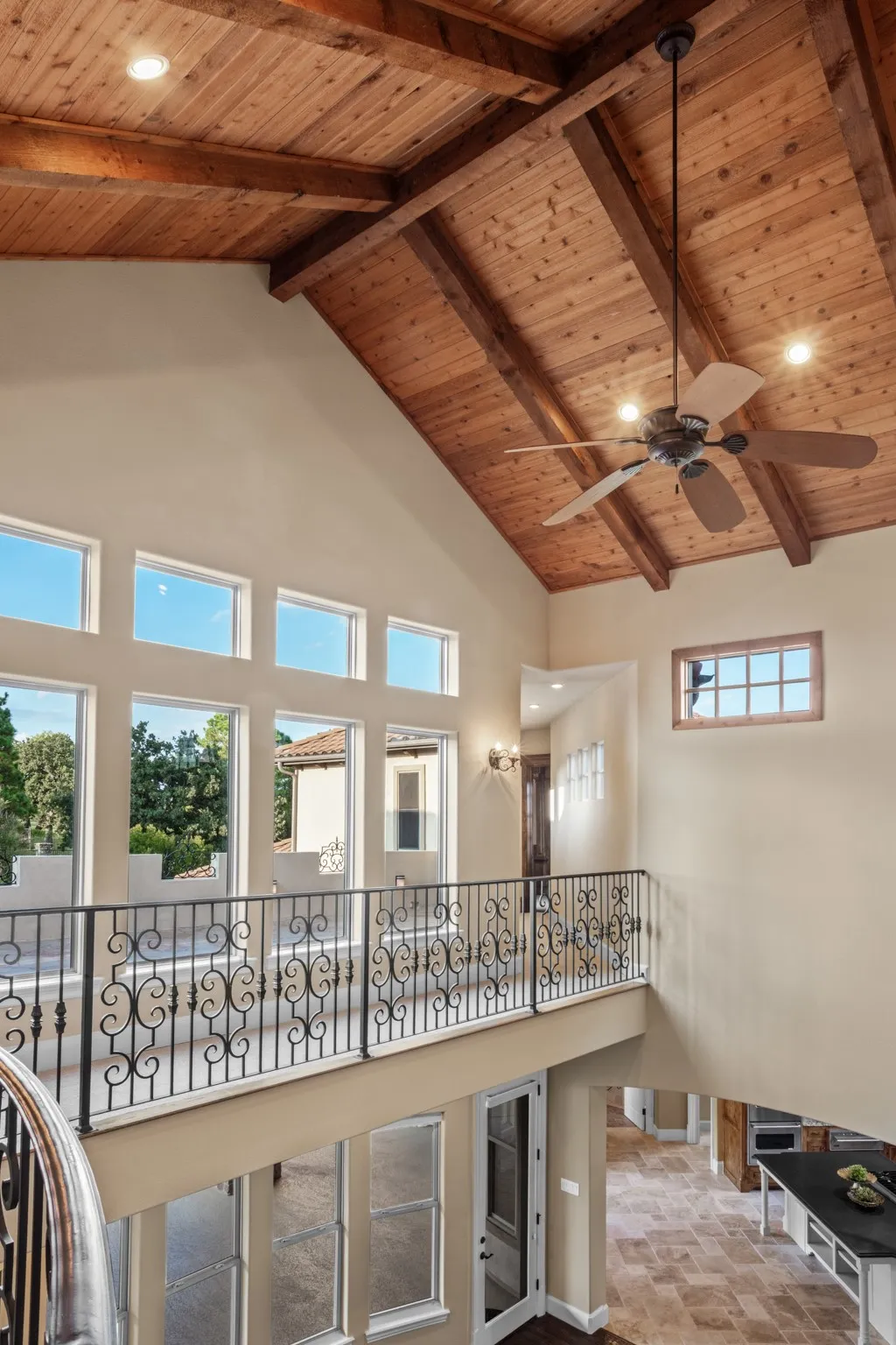 Prepare to be captivated by the soaring, wood-paneled cathedral ceiling and exposed beam architecture that crown the heart of this stunning 6-bedroom estate in the prestigious community of The Landing. Walls of windows span both the first and second floors, flooding the interiors with natural light and unveiling panoramic views of your private backyard paradise—featuring a resort-style pool, bubbling spa, expansive terrace, and covered patio—all nestled on over 2 serene acres.