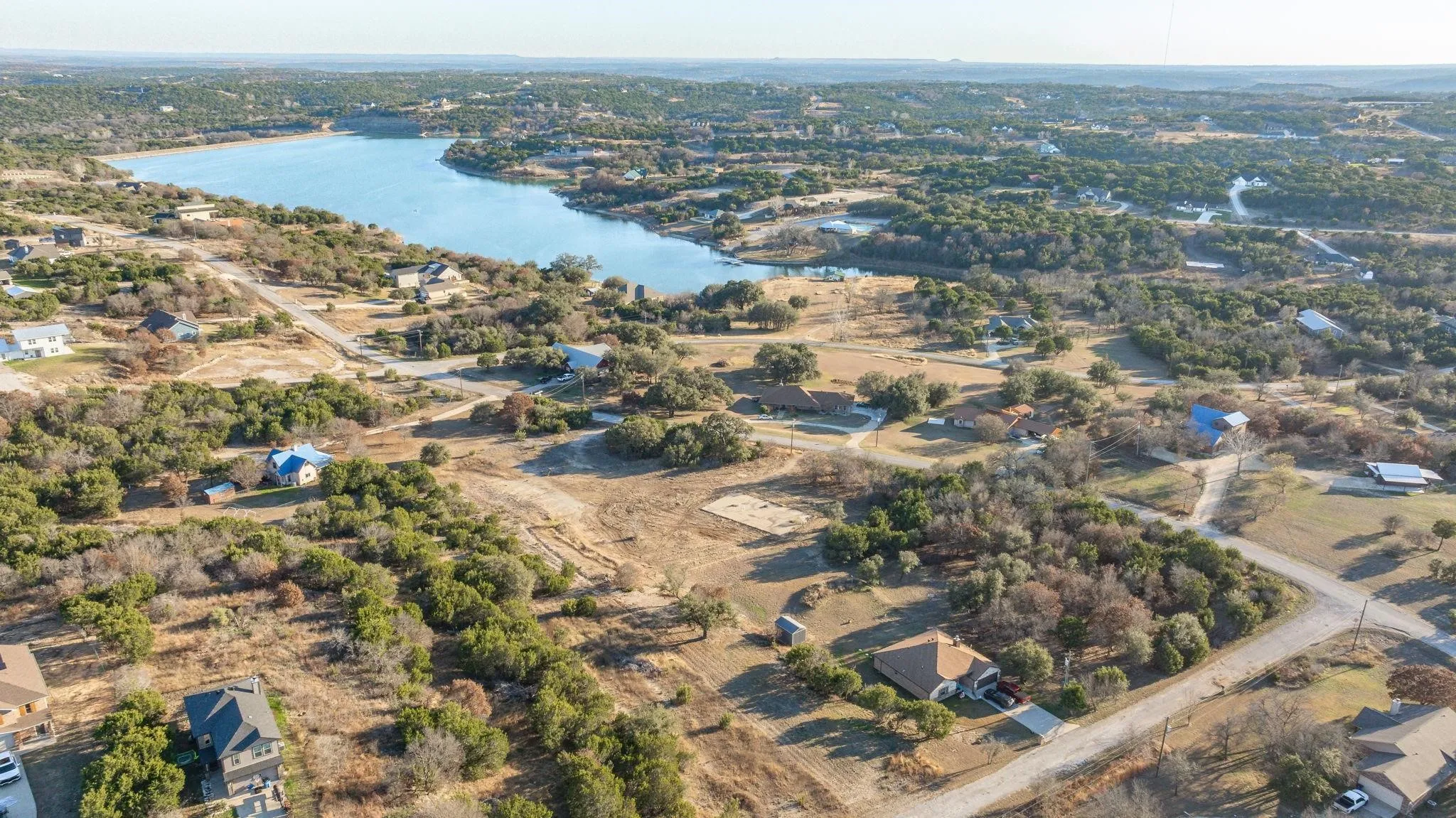 Aerial overview of property's location featuring a nearby body of water