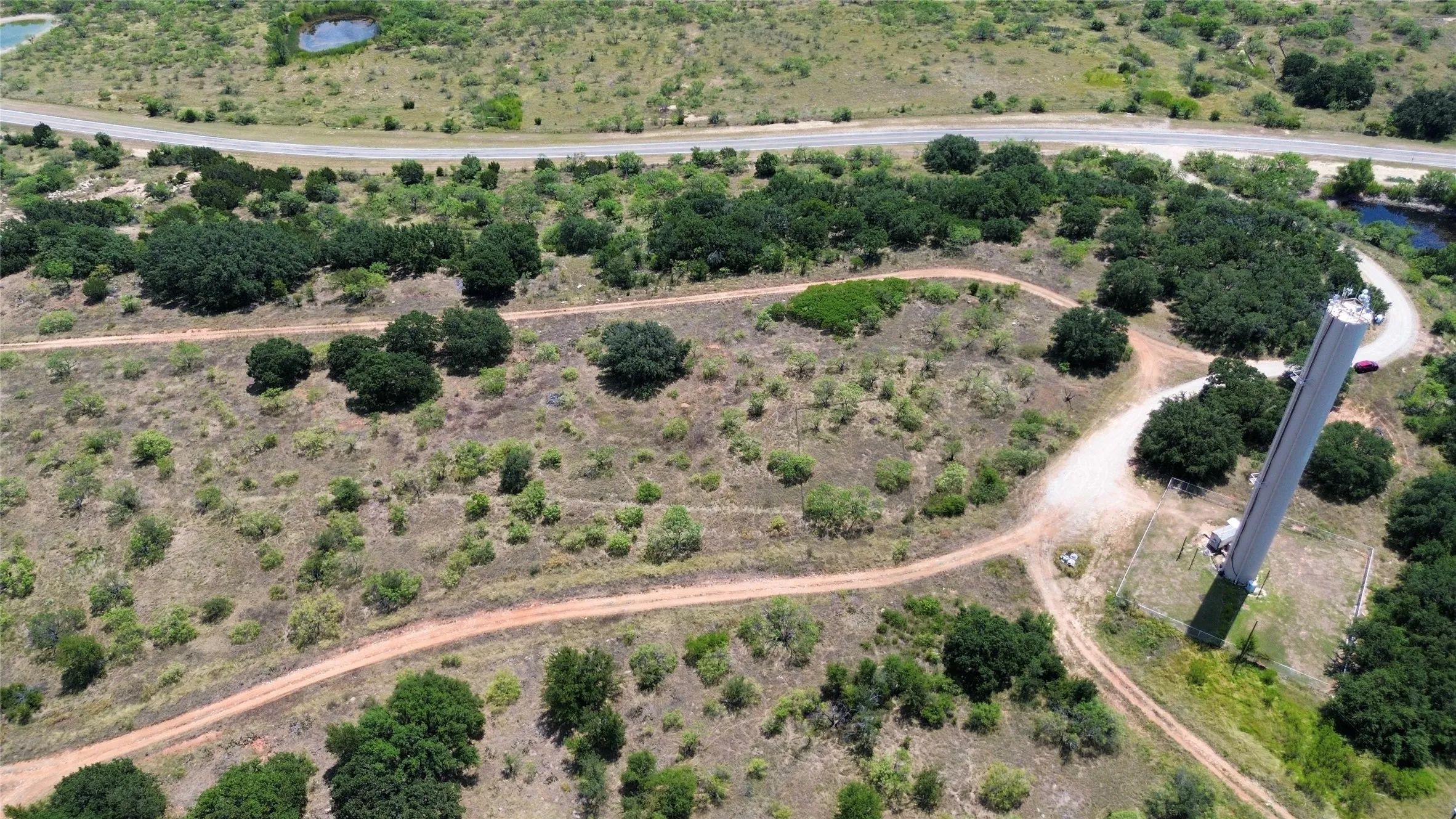 Aerial overview of property's location with rural landscape
