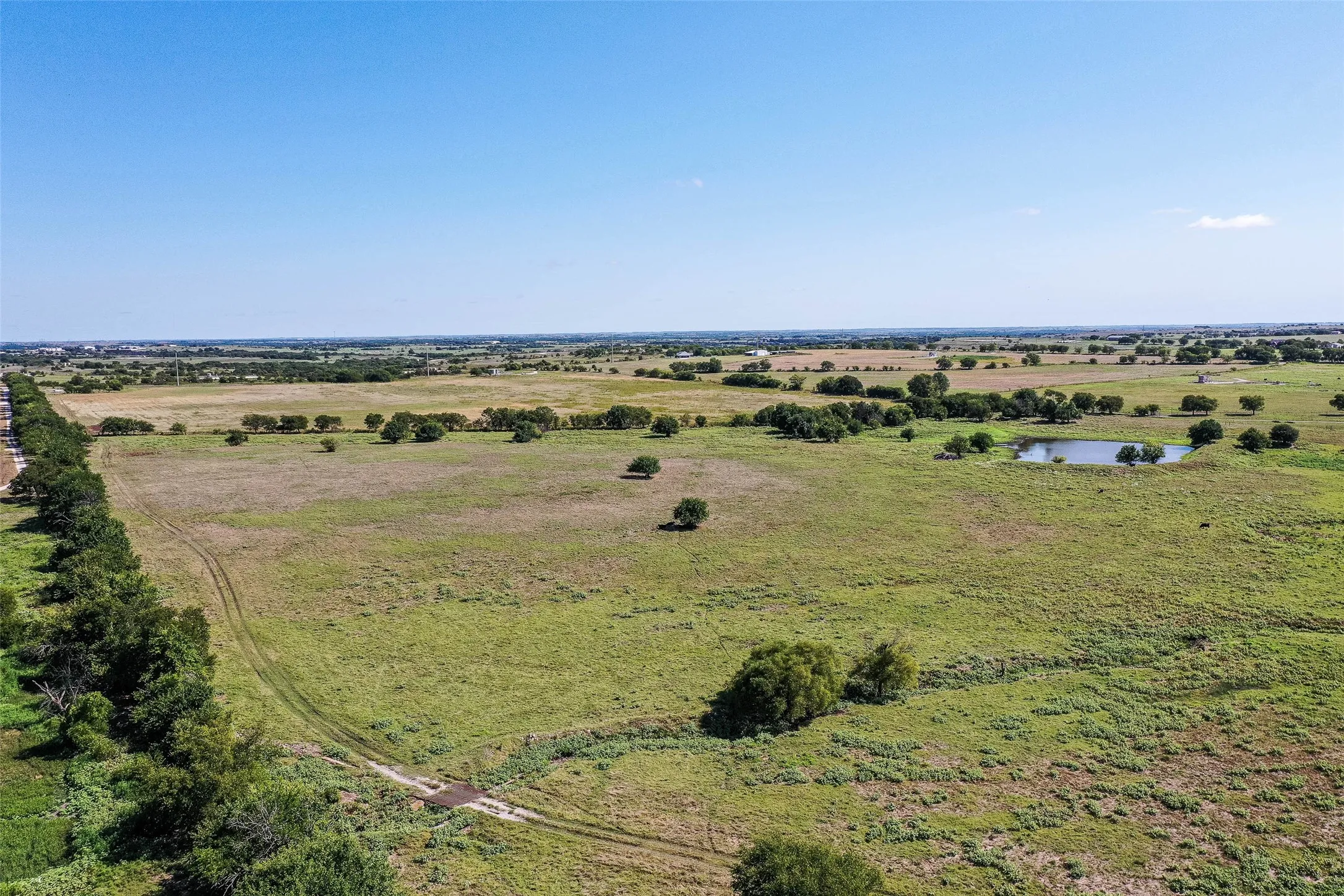 Overview of rural landscape with a large body of water