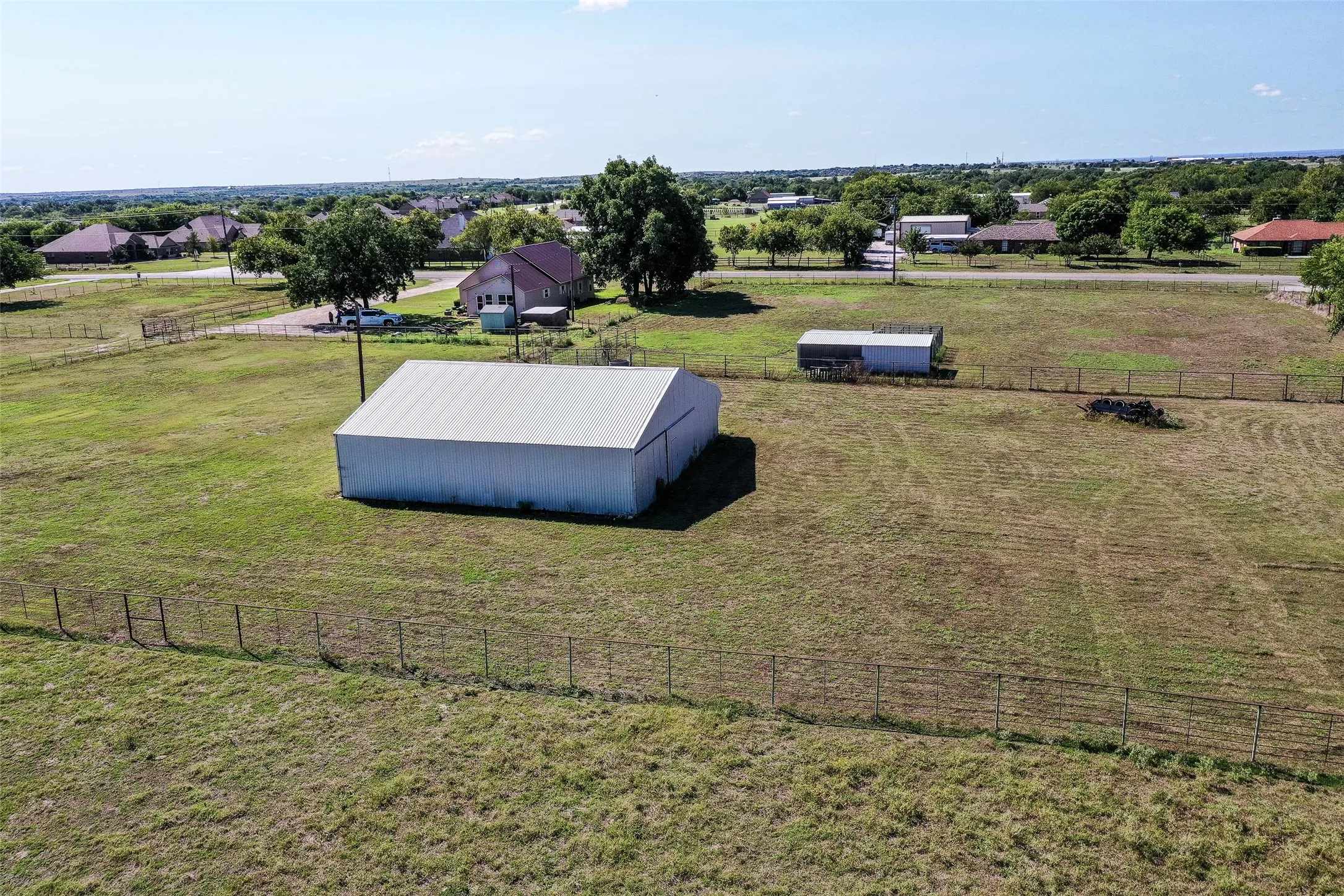 Overview of rural landscape featuring agricultural land
