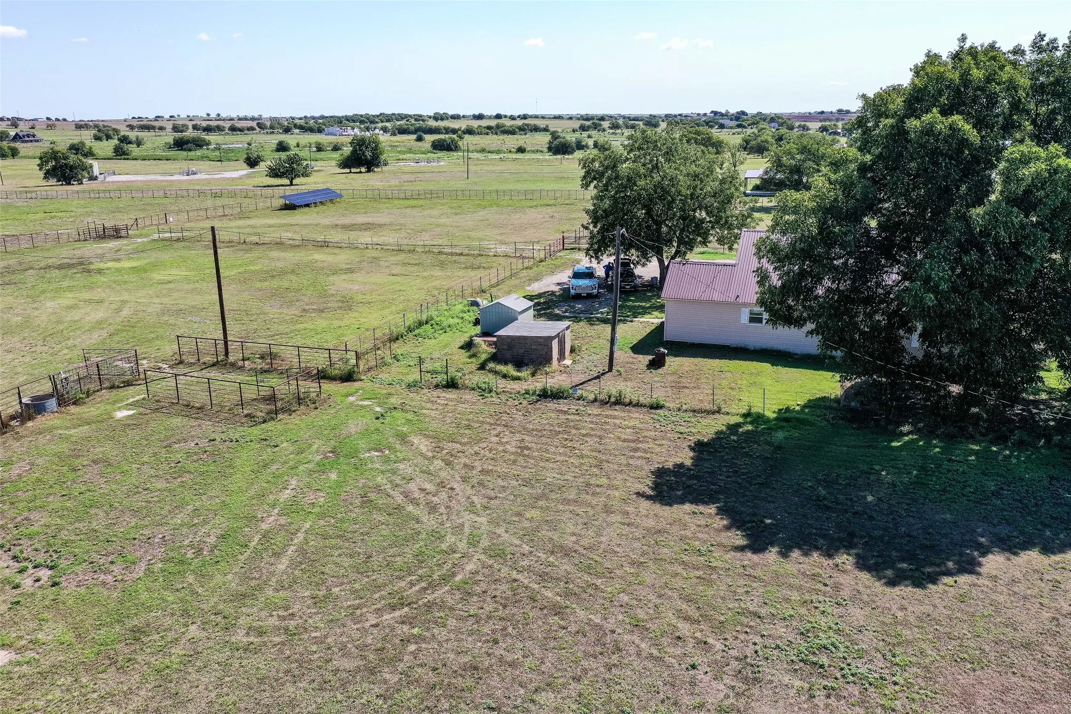 Aerial view of sparsely populated area with agricultural land