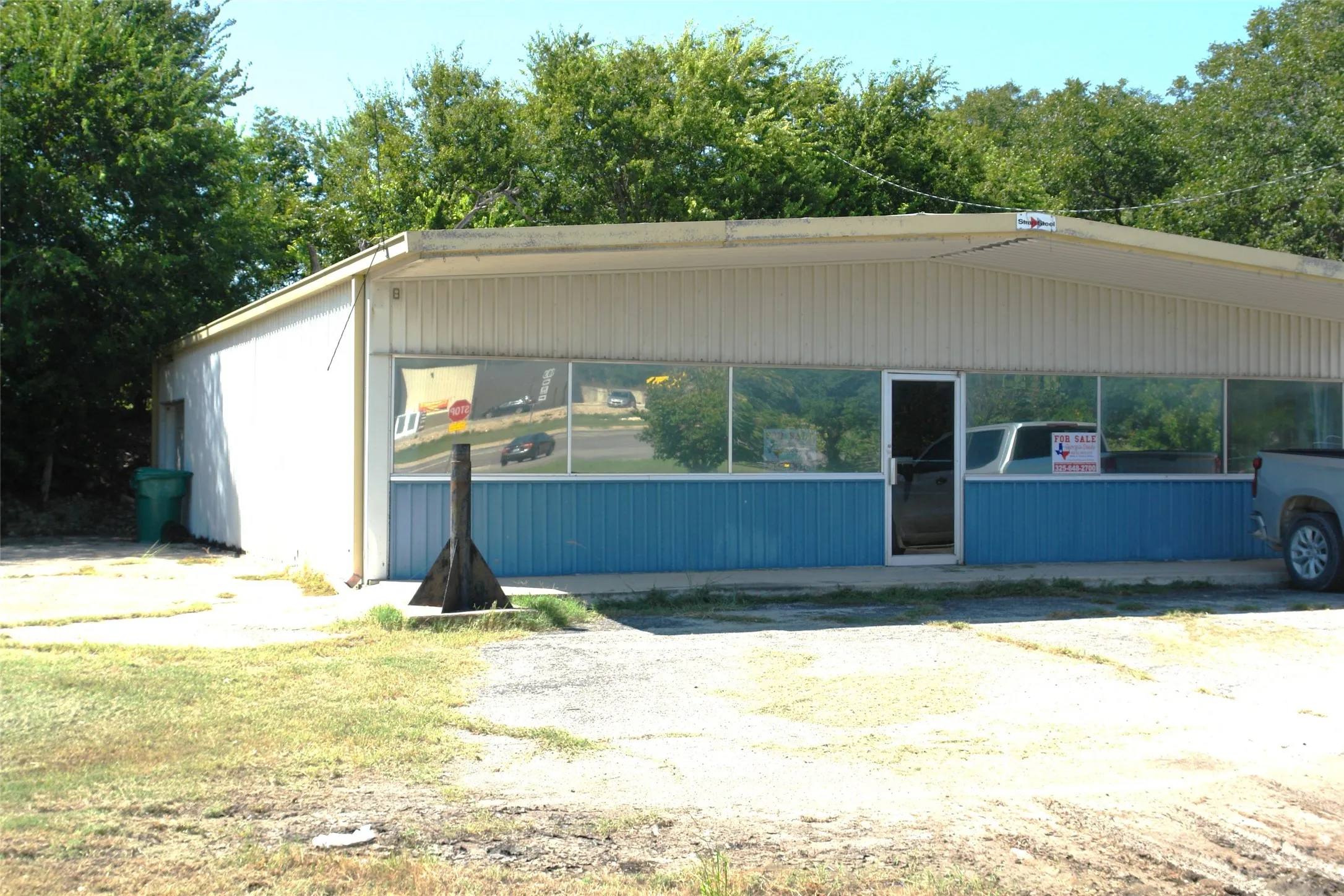 View of front of house featuring a carport