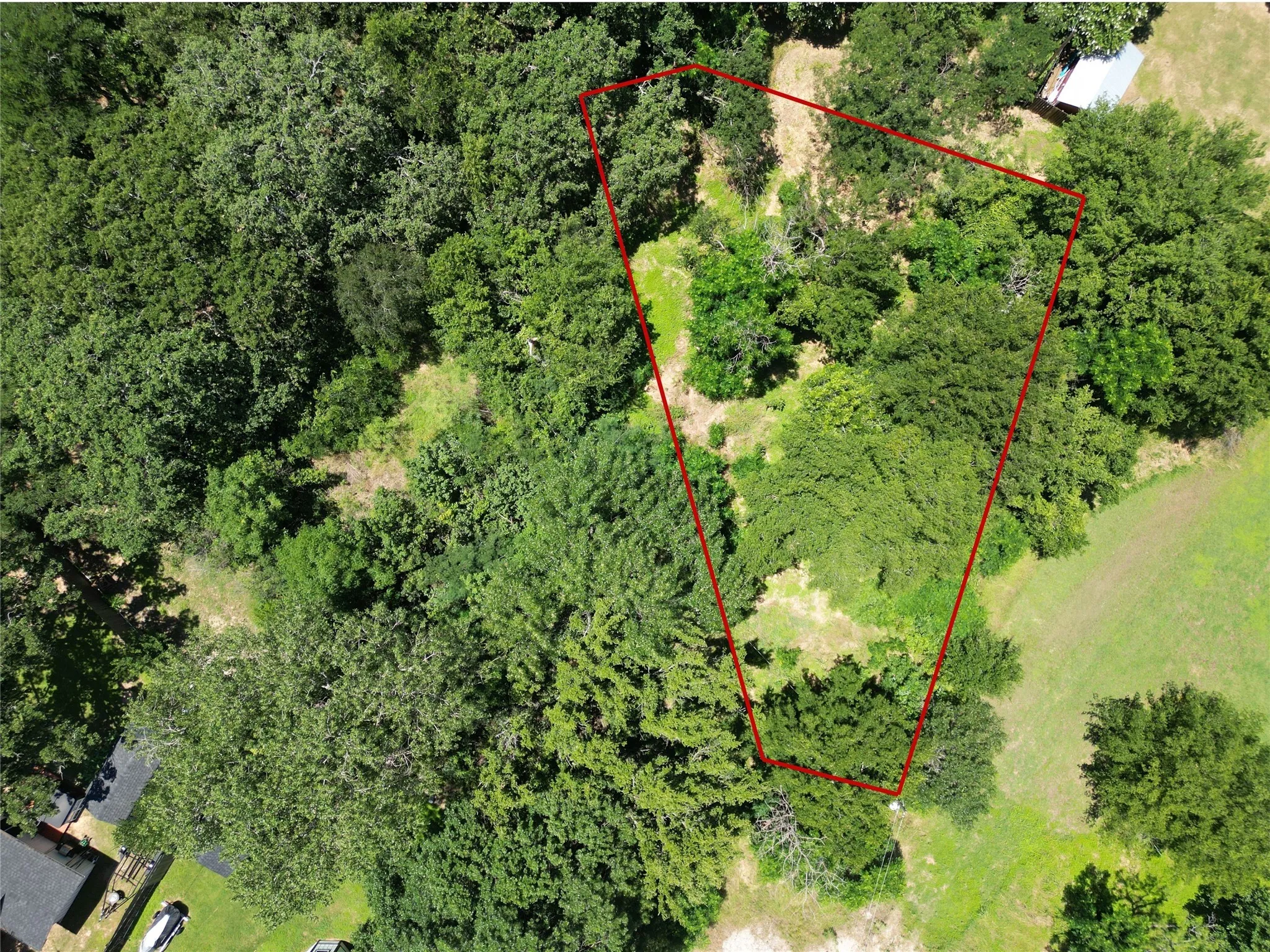 Aerial view of property's location with property parcel outlined