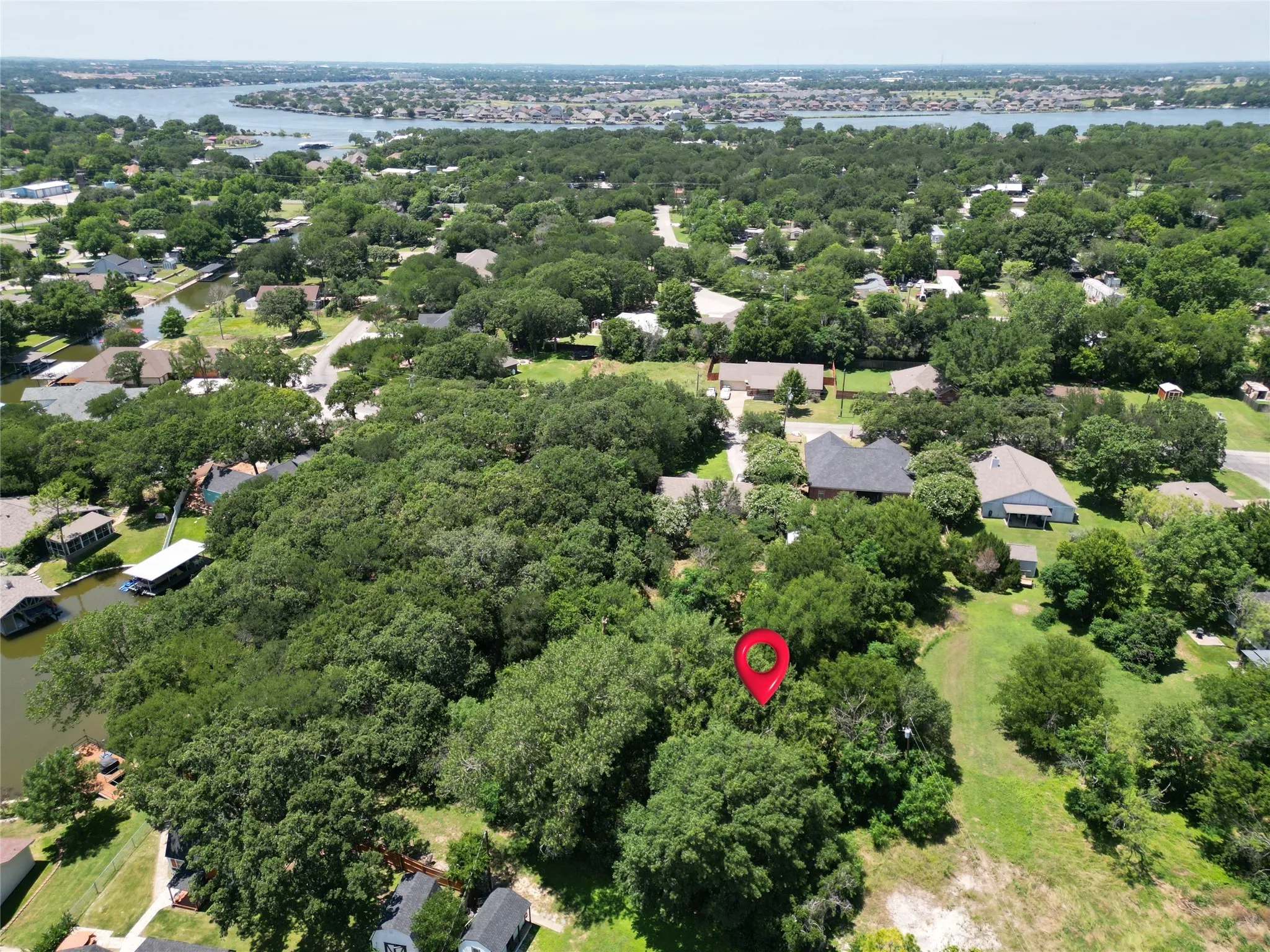 Aerial view of residential area with a nearby body of water