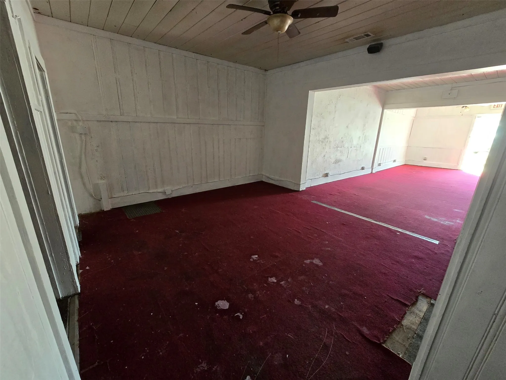 Spare room featuring ceiling fan and wood ceiling