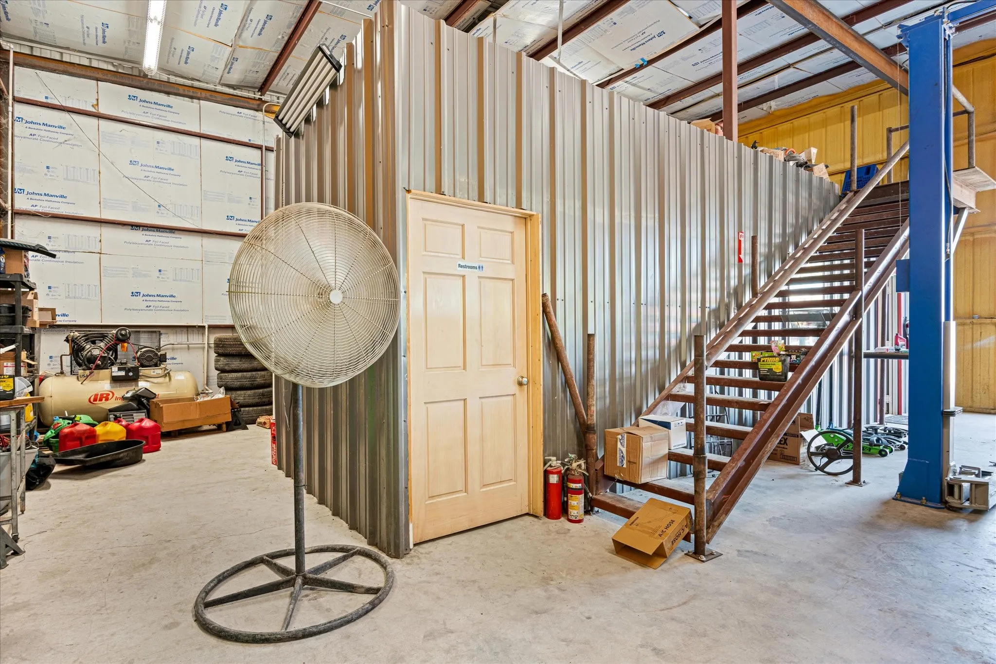 Below grade area featuring metal wall