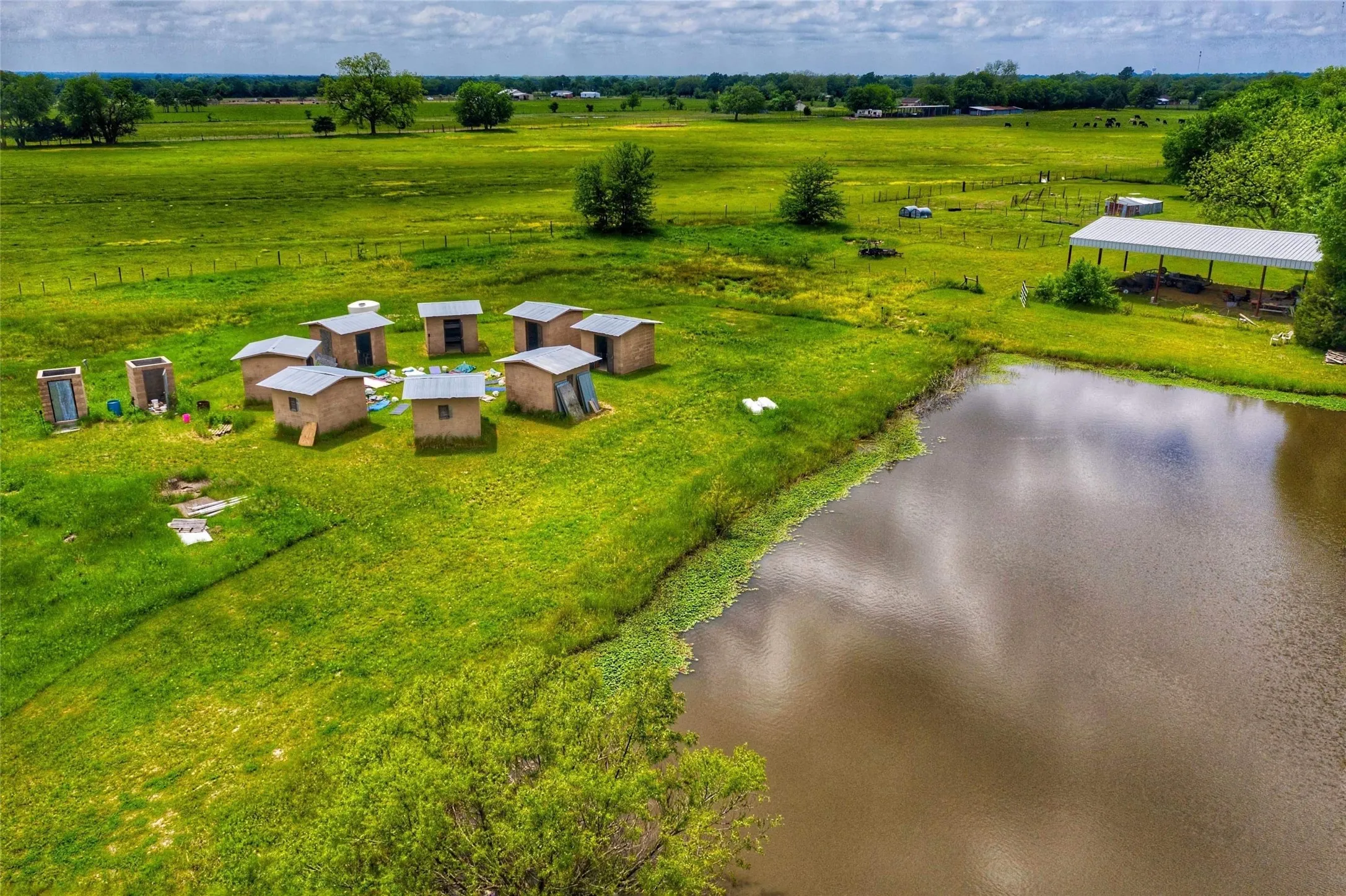 Huts and Pond