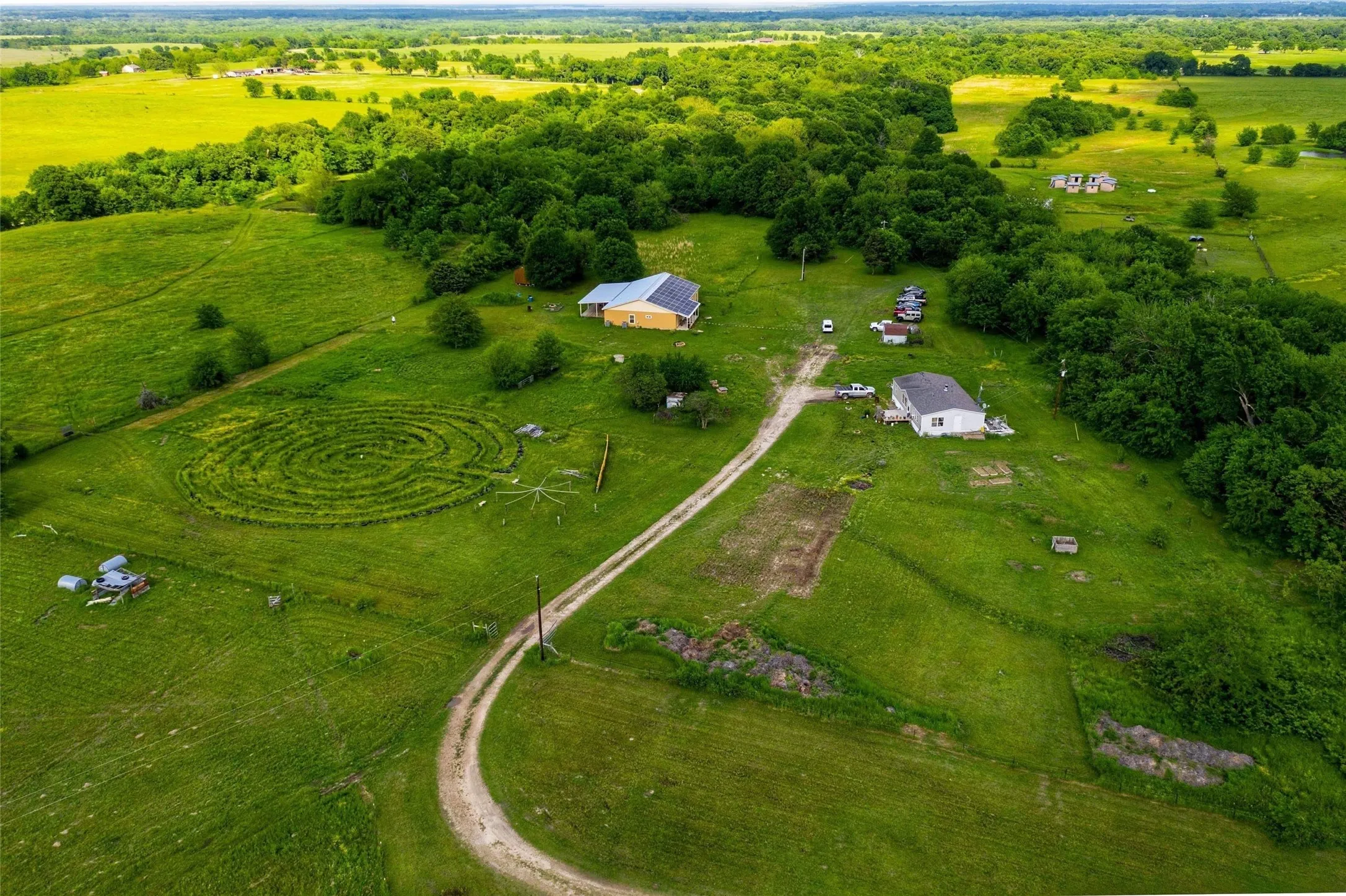 Driveway to house.  Note:Manufactured home on right no longer there.