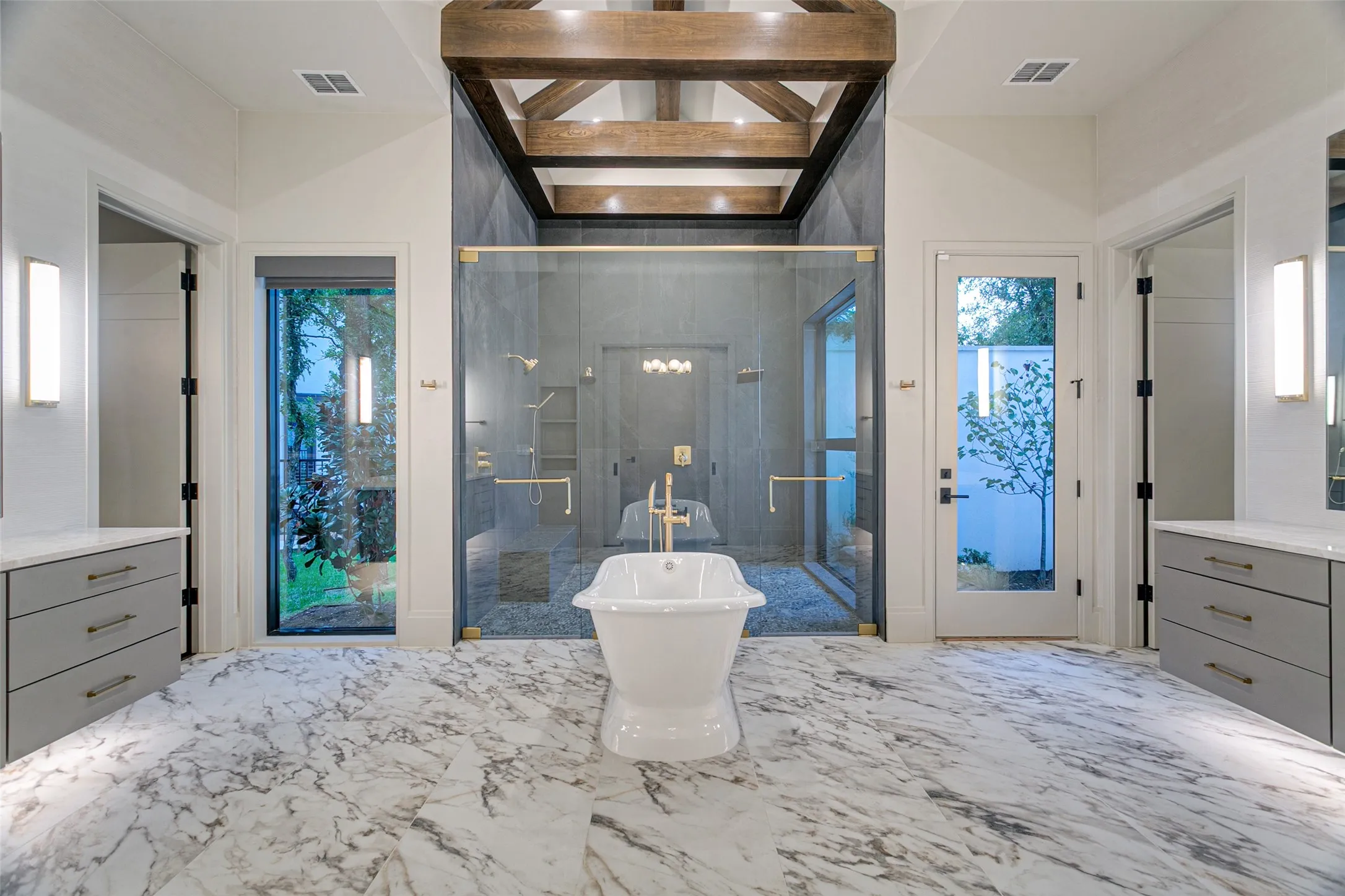 Master Bath with double shower entry and door to Zen garden