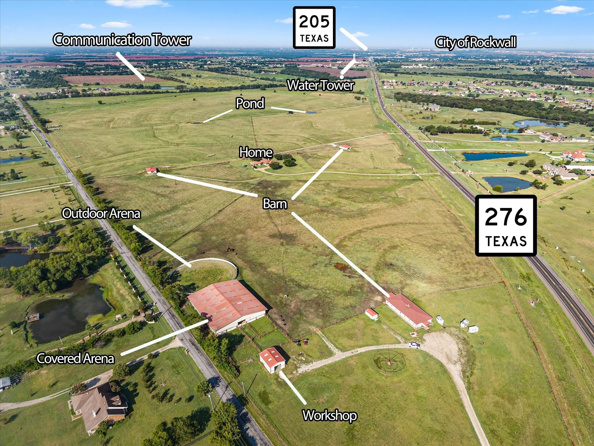 Paved access via Streetman Road, with adjacent 8” water line and pipe fencing.  Rear perimeter featuring barbed wire fencing along the quiet, rural setting of Melody Lane.