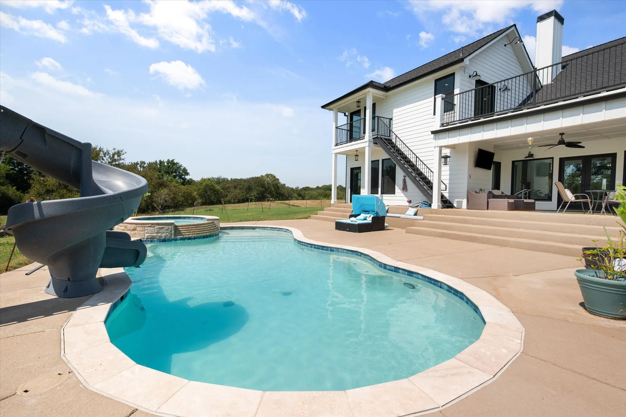 Beautiful pool features an incredible slide!