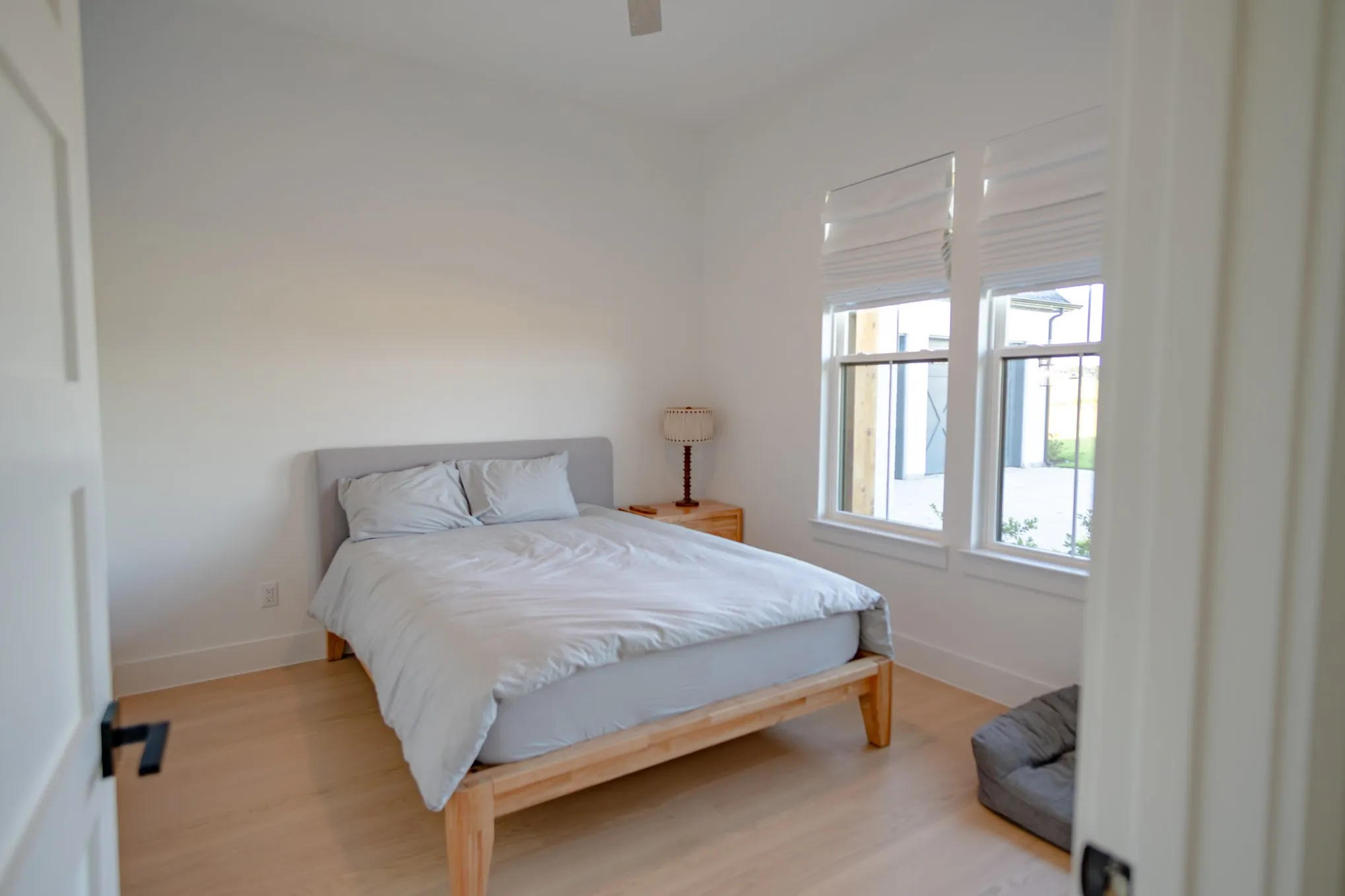 Bedroom with wood finished floors and ceiling fan