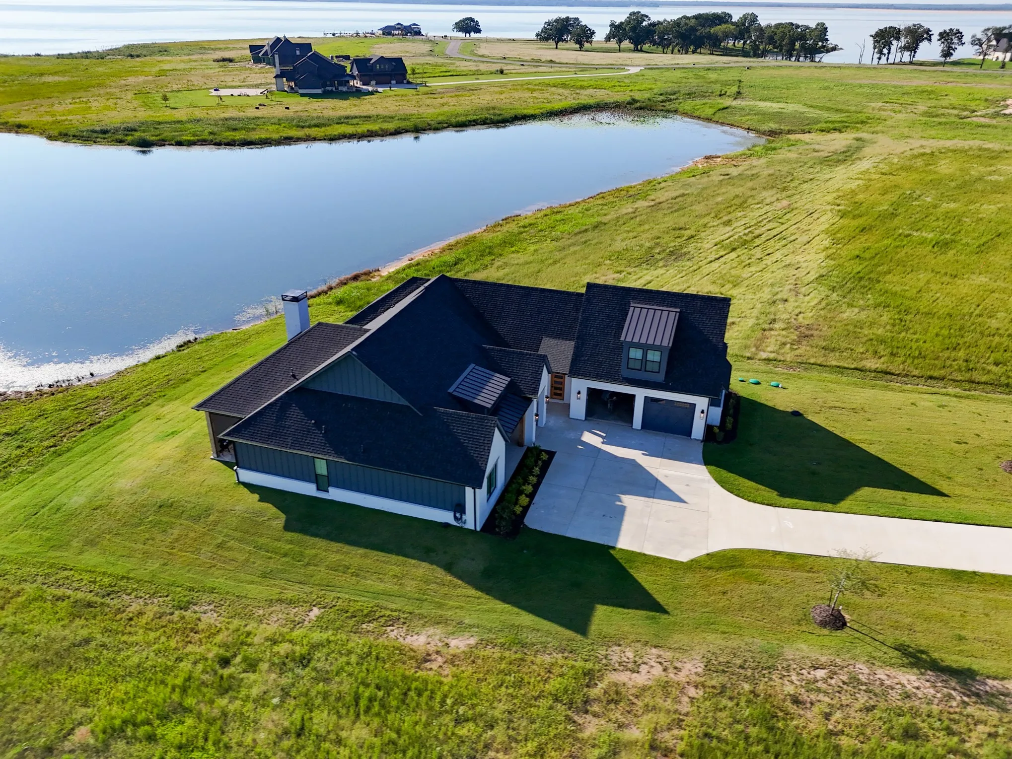 View of subject property featuring a nearby body of water