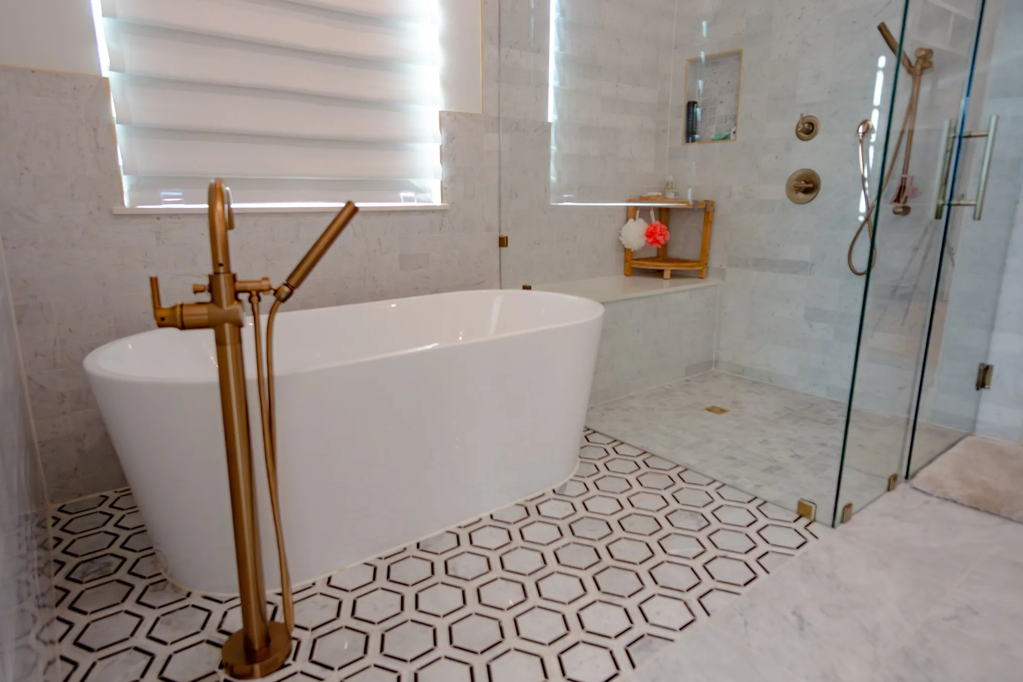 Full bath featuring a stall shower, tile walls, and a soaking tub