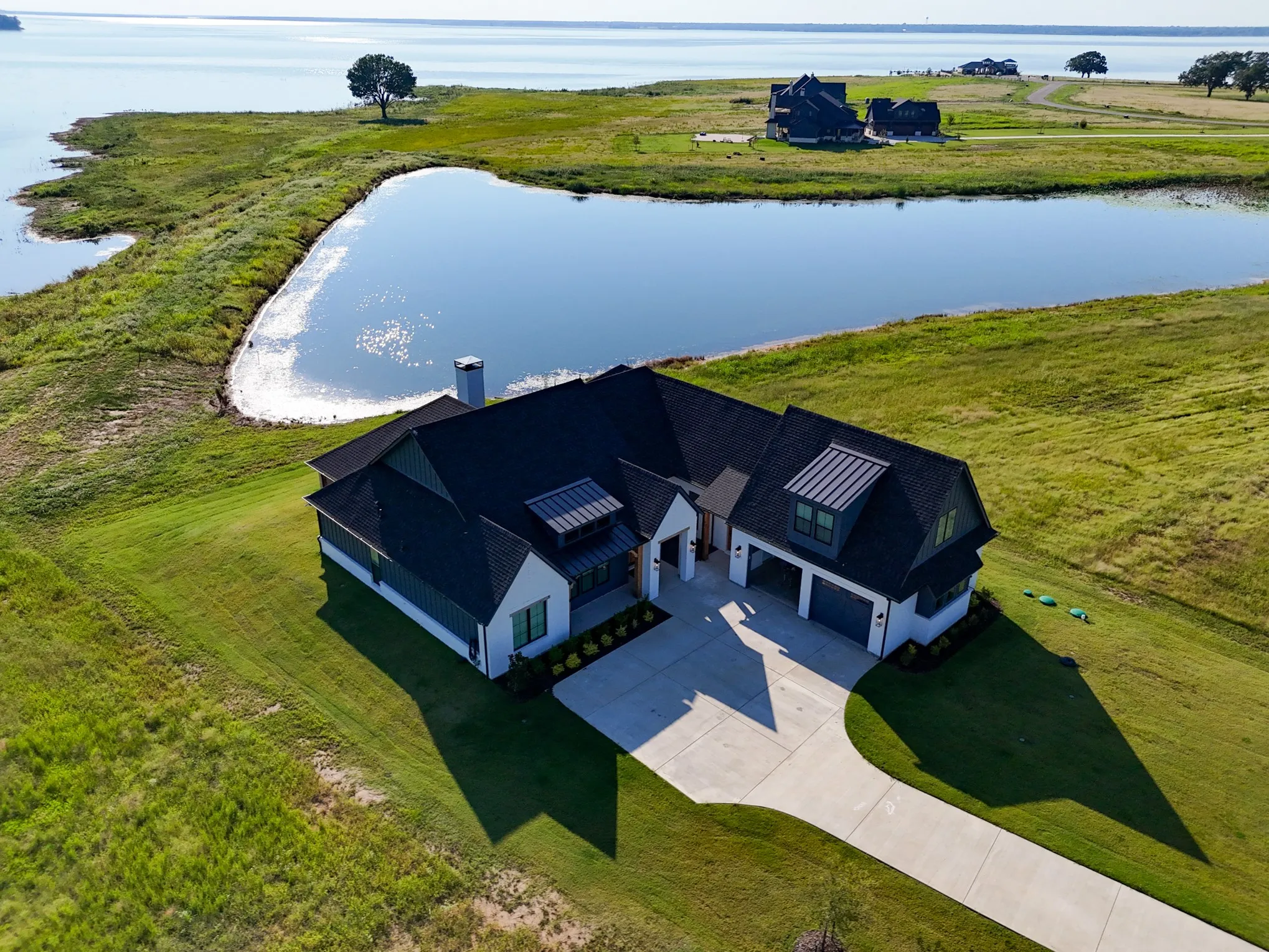 View of subject property featuring a nearby body of water