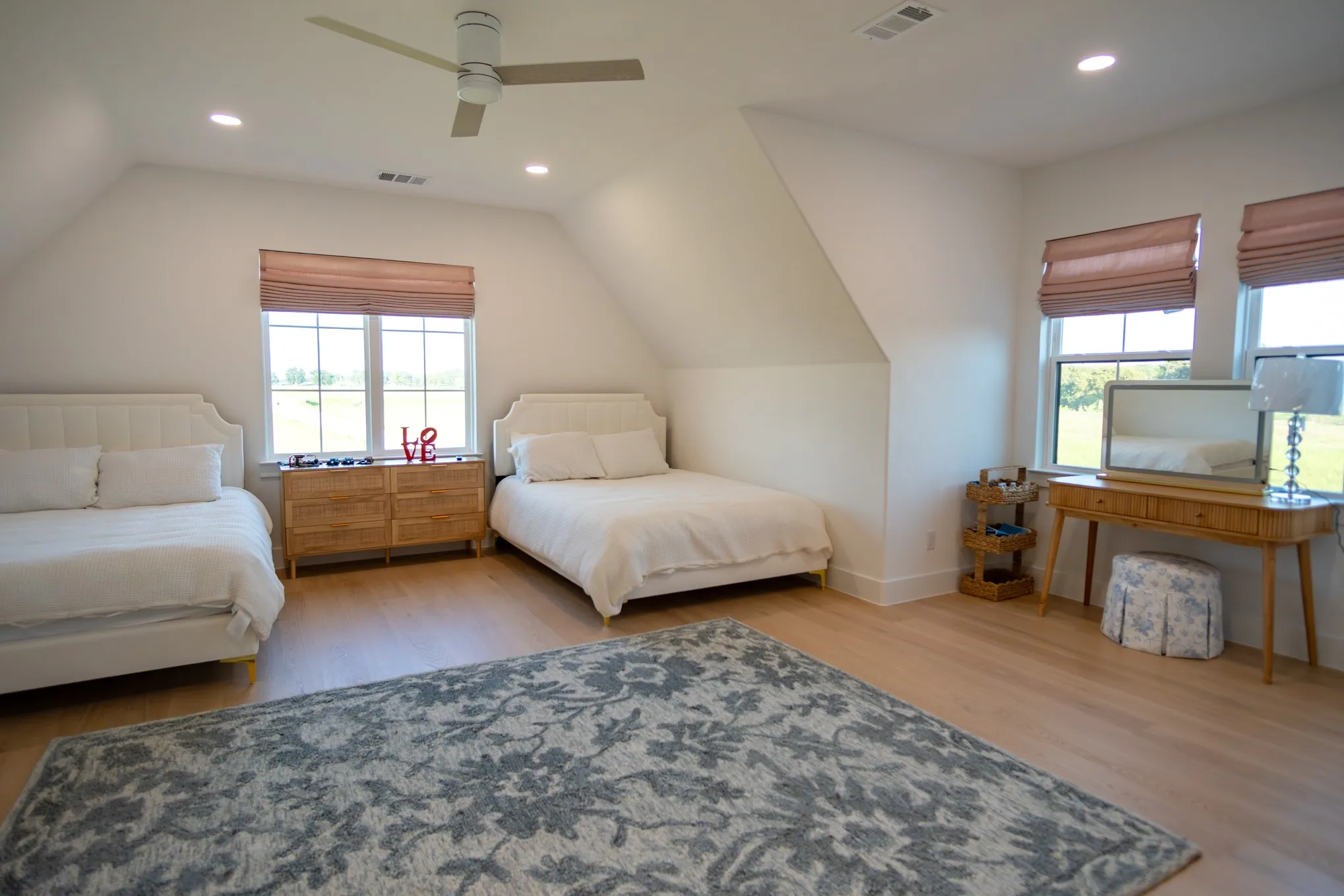Bedroom featuring lofted ceiling, light wood-style flooring, recessed lighting, and a ceiling fan