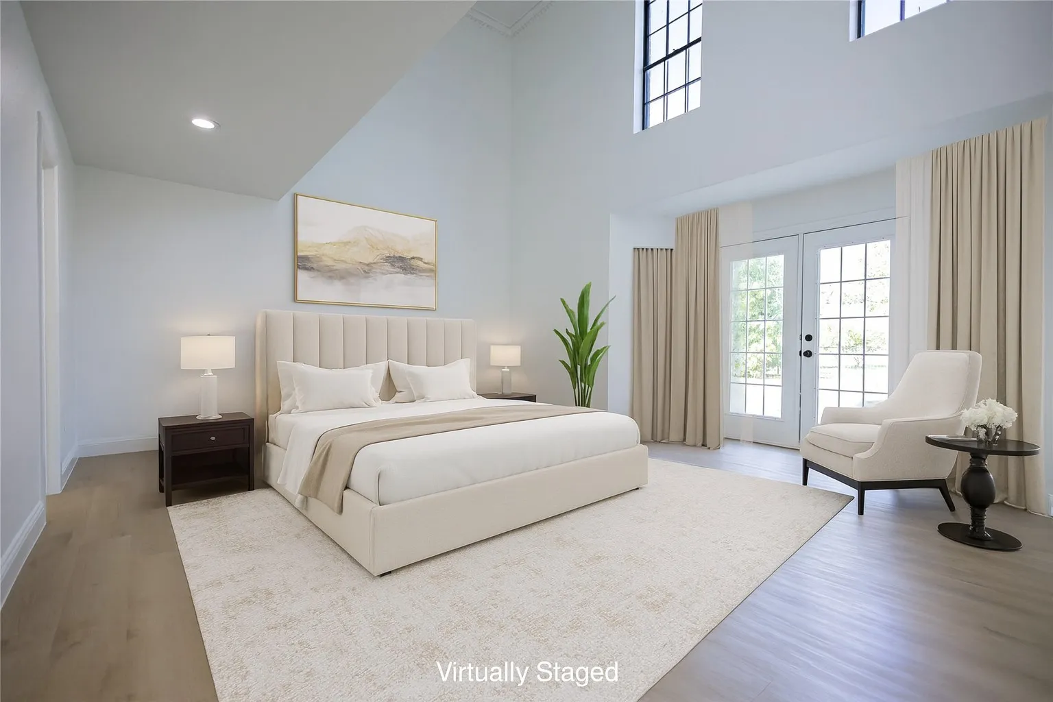 Primary suite with once again, soaring ceilings, it's own exterior door to the pool deck and so much natural lighting!!