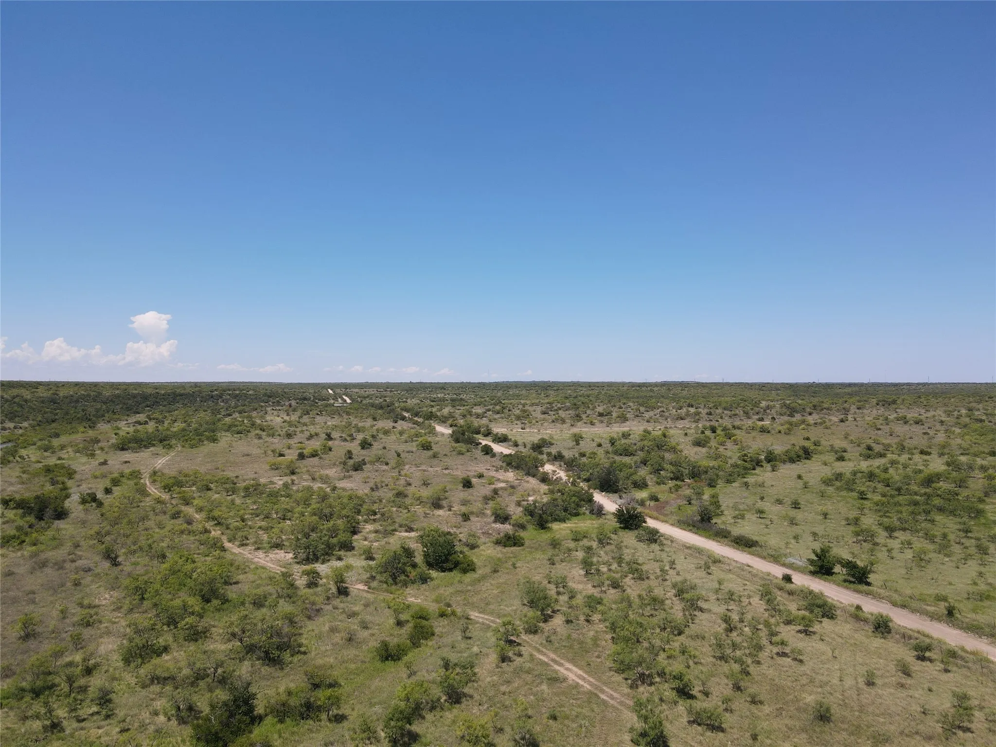 Aerial view of sparsely populated area featuring a desert landscape
