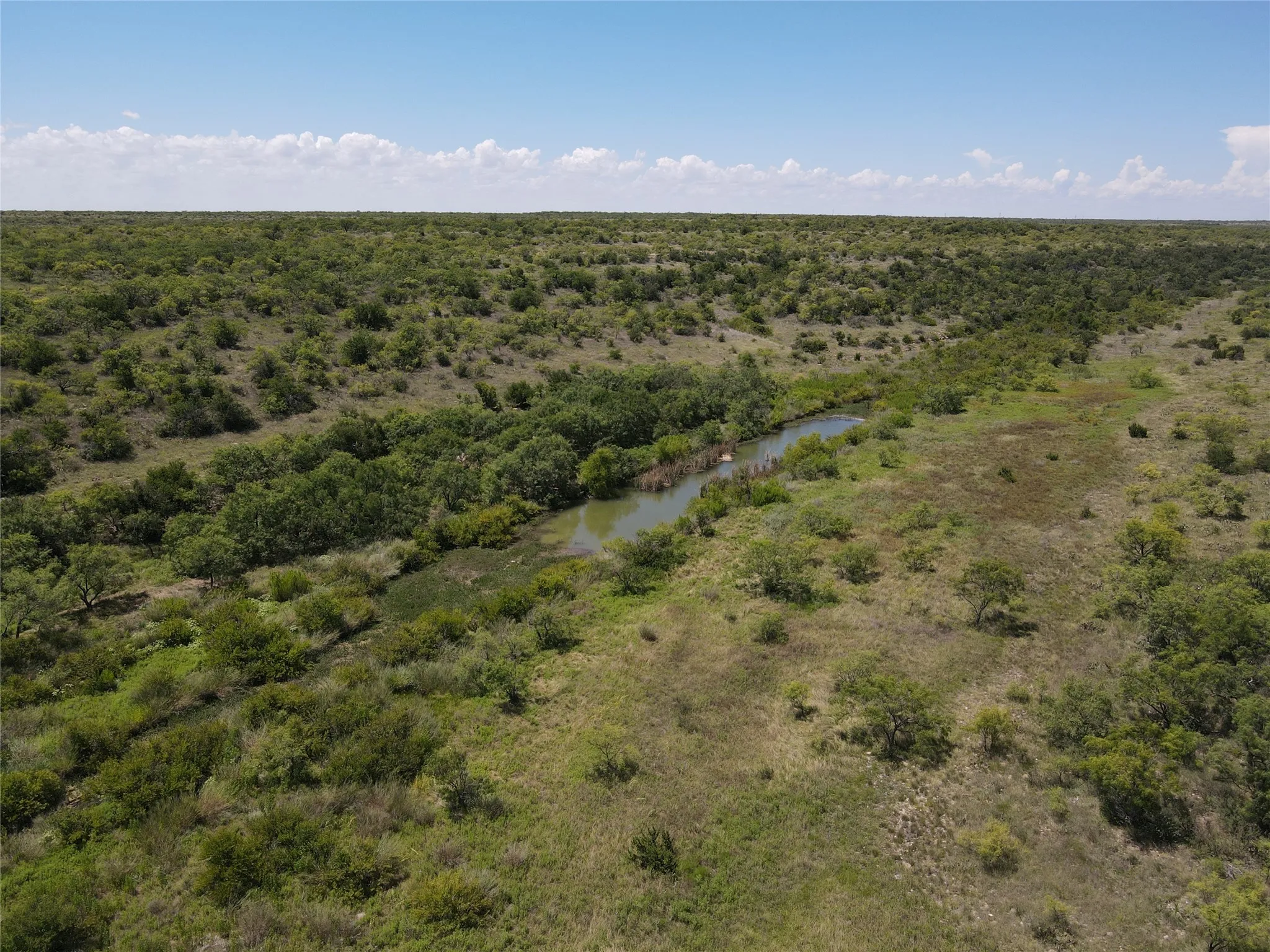 View of rural area featuring a nearby body of water