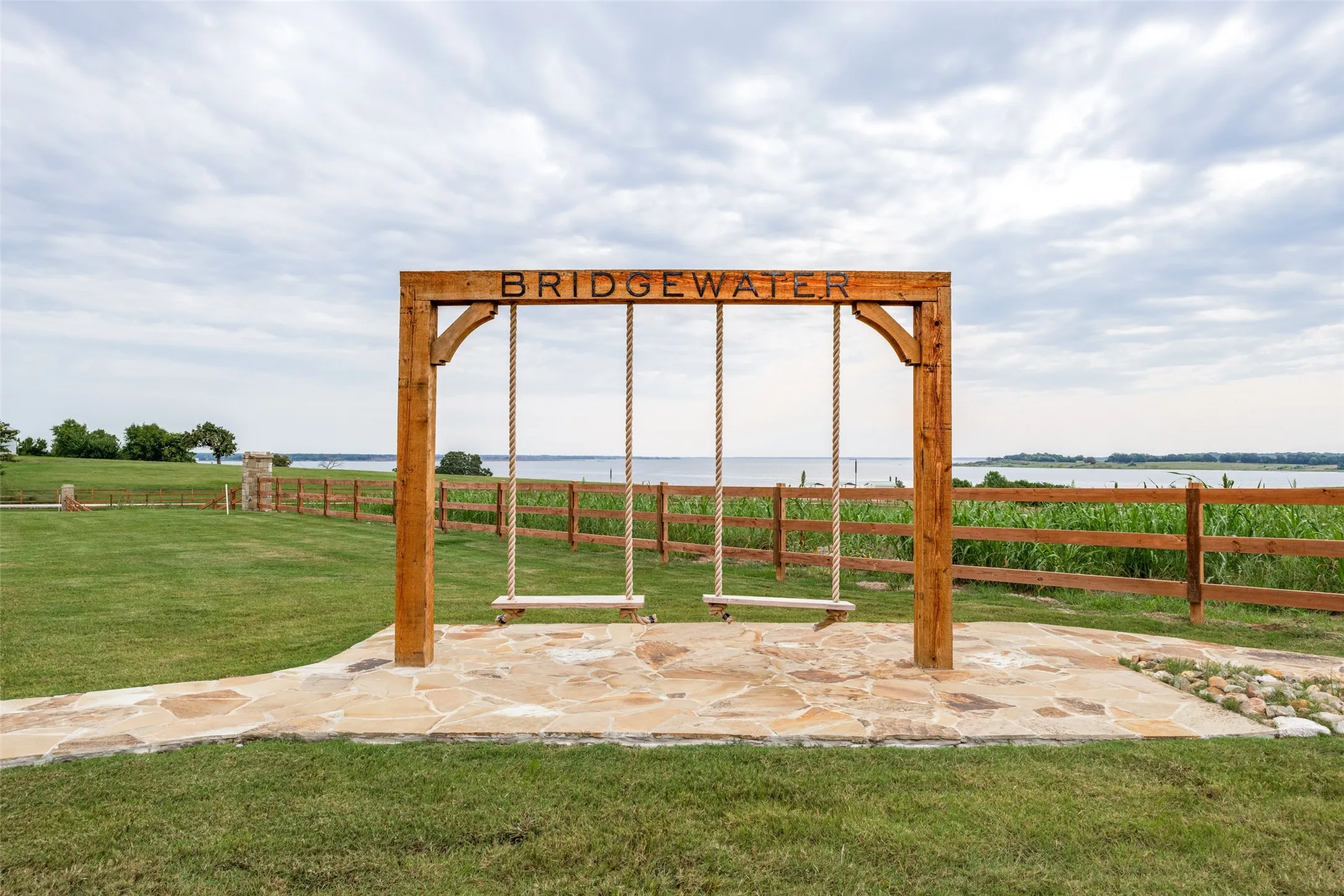 View of patio with a water view