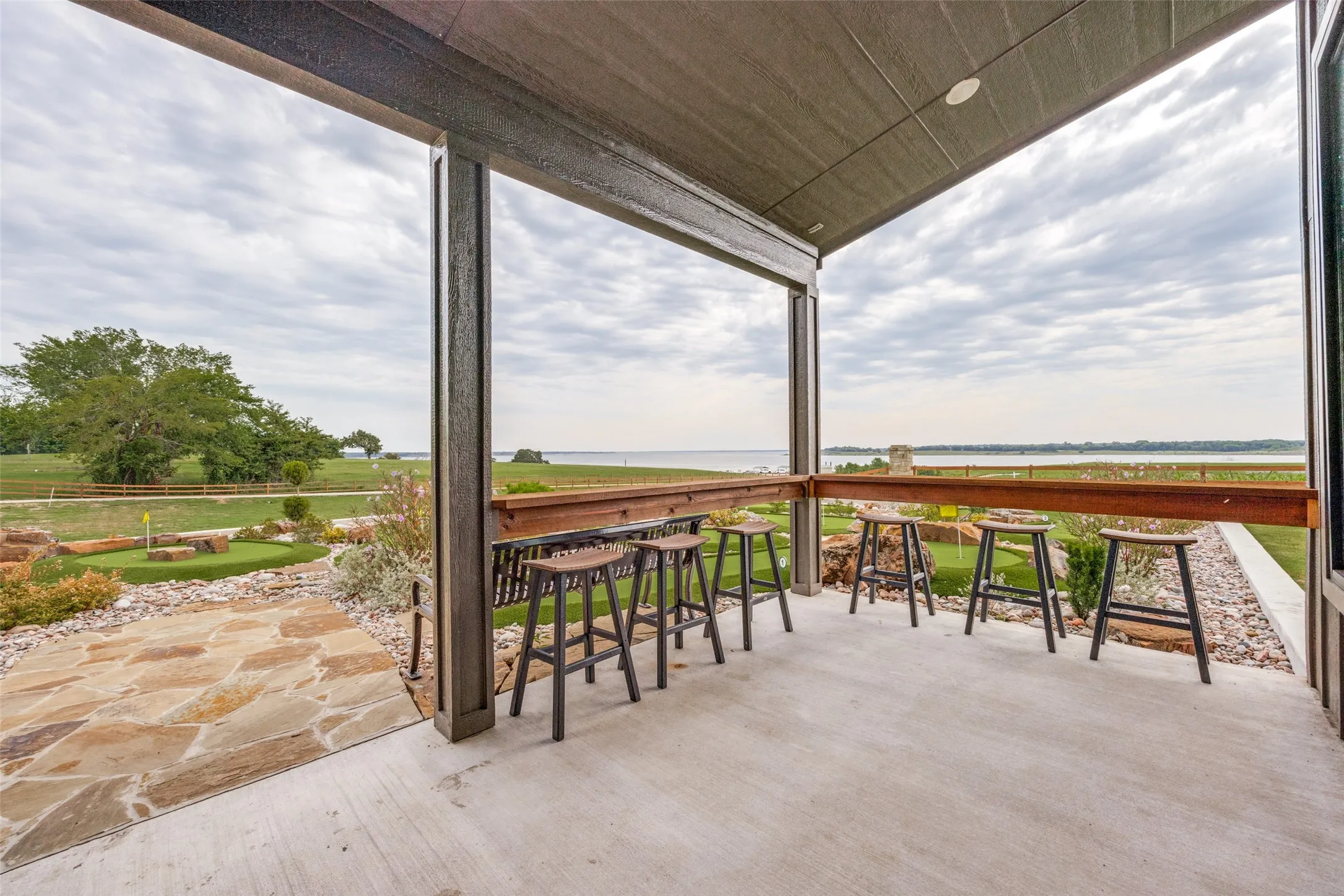 Patio / terrace featuring a water view