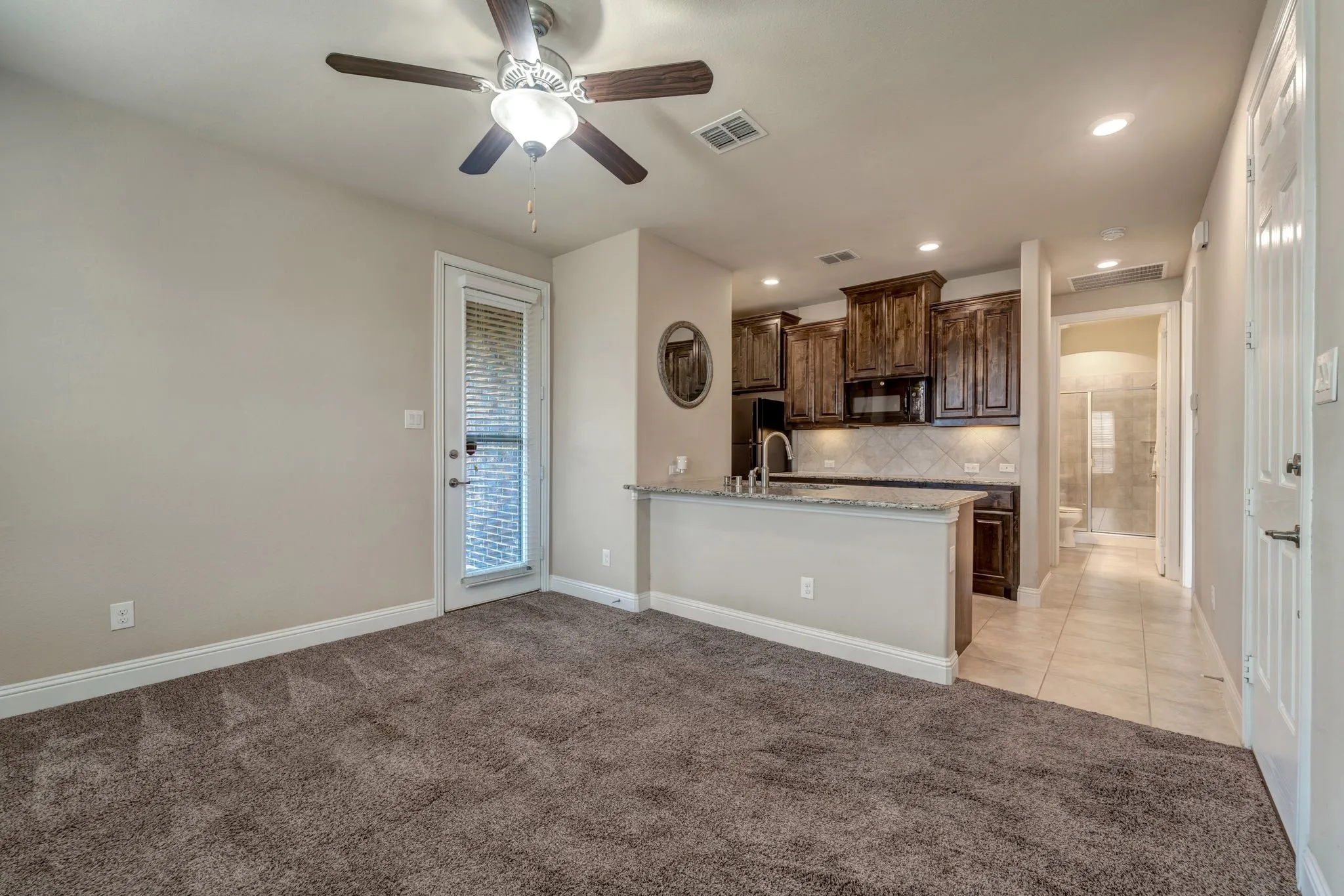 Private apartment - Granite countertops in kitchen with convection microwave (plumbed for gas to add a cooktop range) equipped with dishwasher and garbage disposal!