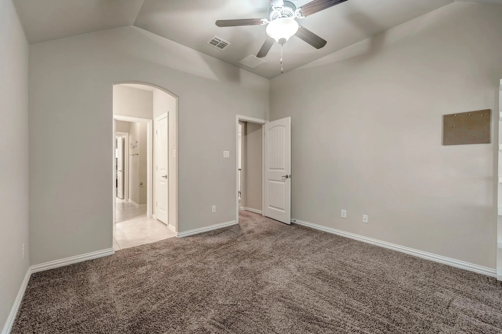 Spacious upstairs bedroom with private bathroom and access to game room. Great closet space!