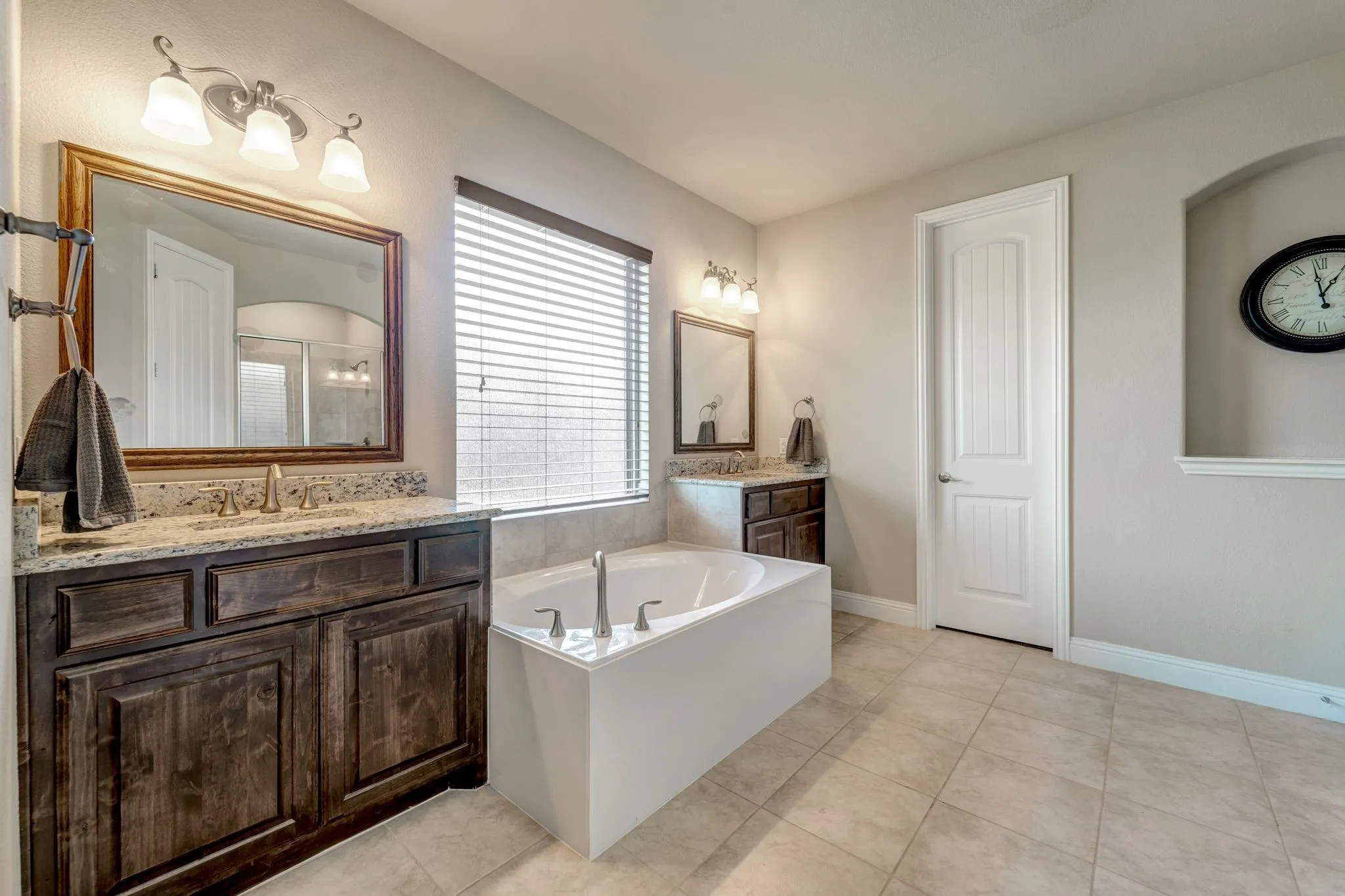 Double vanity, garden tub and large walk in closet!