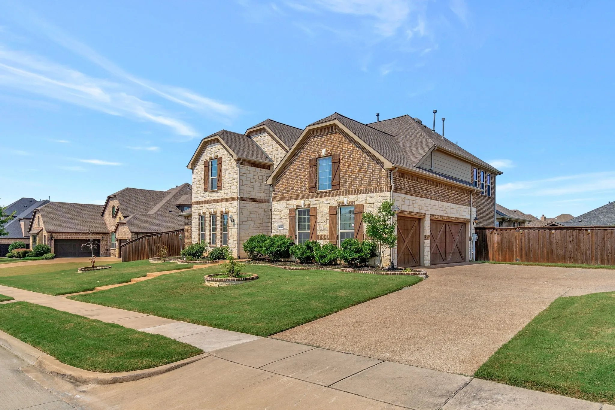 Stone accents and spacious 3 car garage!