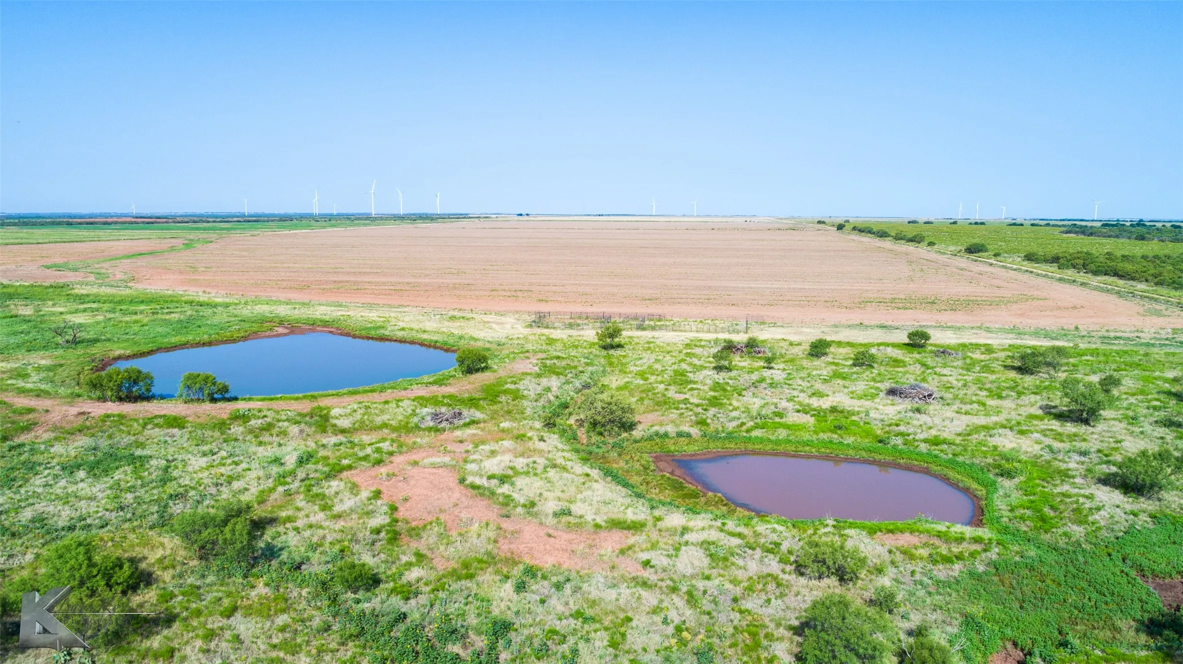 View of yard with a view of rural / pastoral area, a water view, and agricultural area