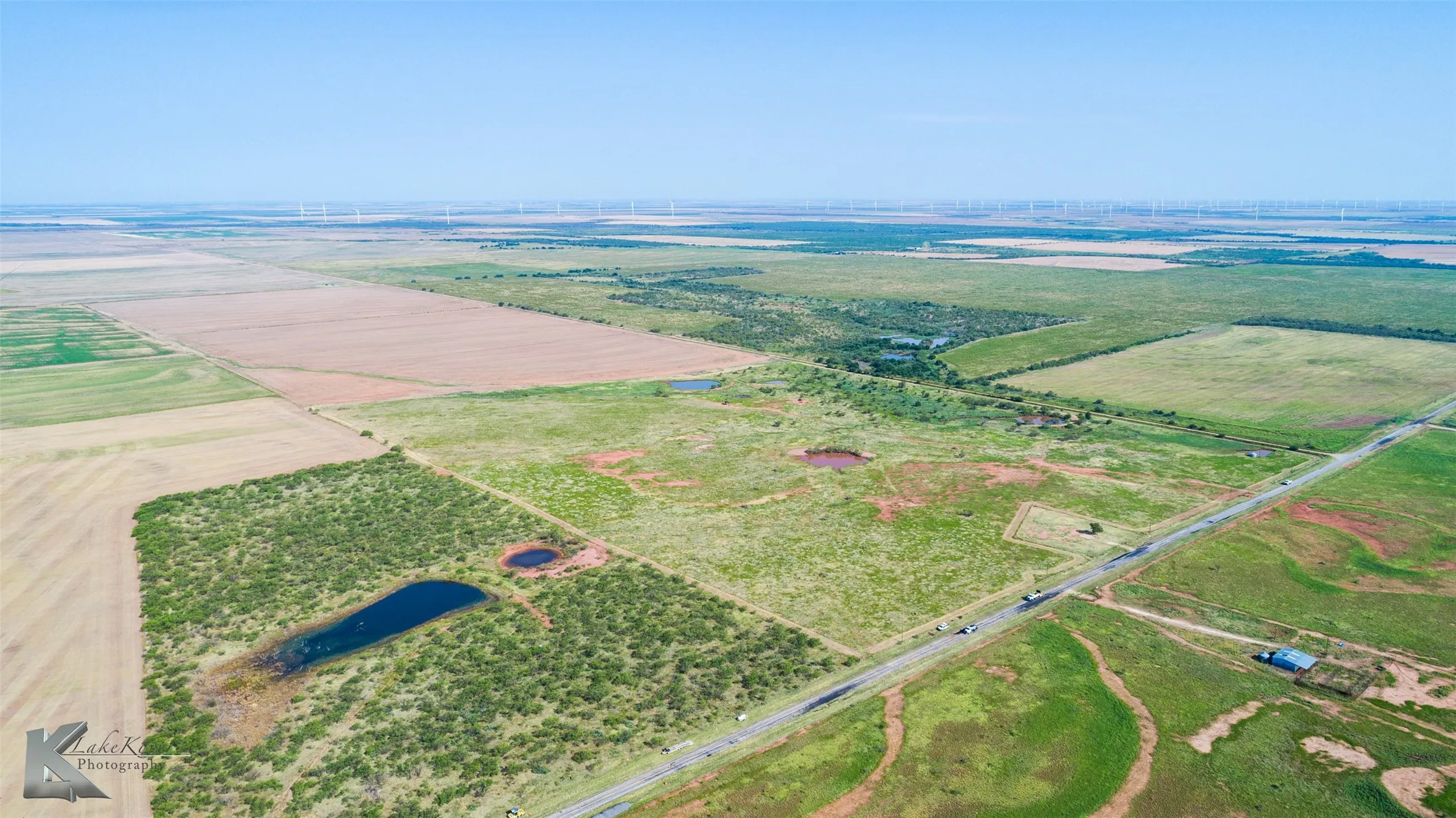 Aerial view of sparsely populated area with abundant farmland
